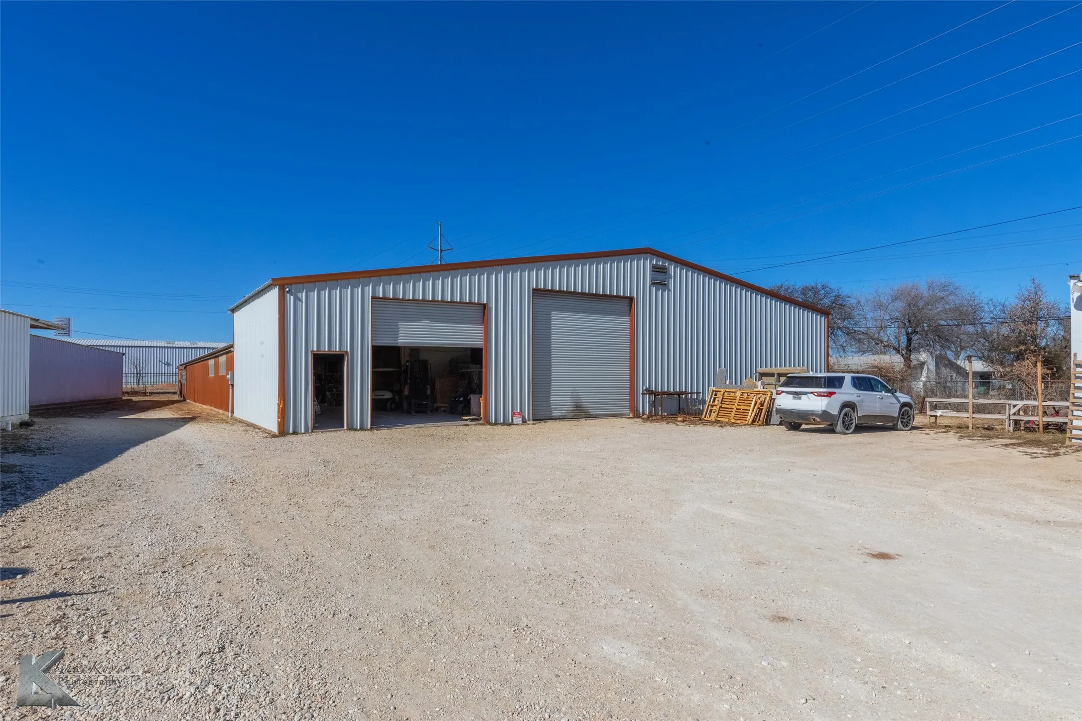 View of outbuilding featuring a garage