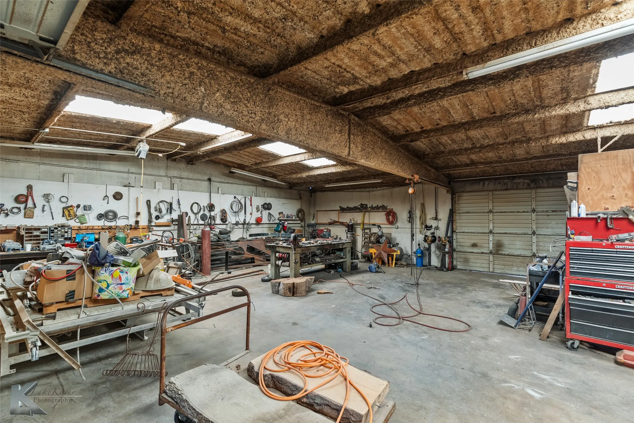 Garage featuring a workshop area