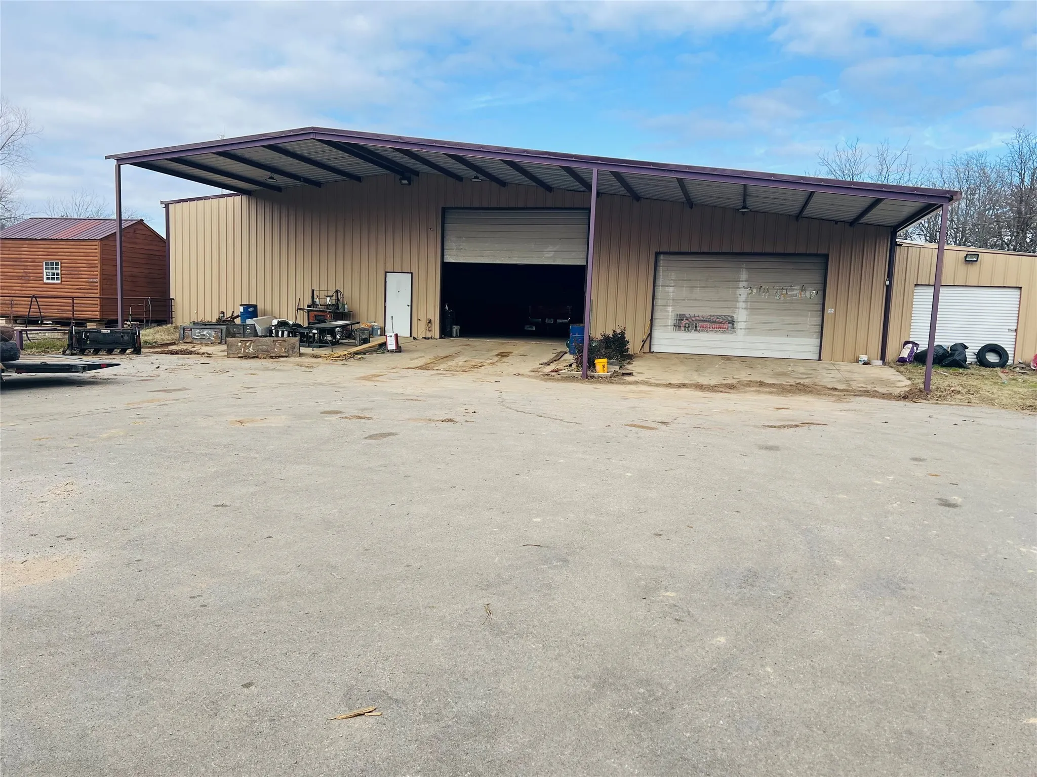 View of outbuilding with a garage