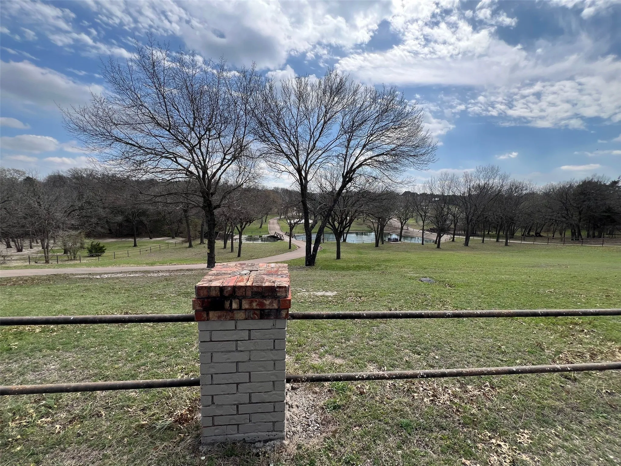 View of yard with a rural view