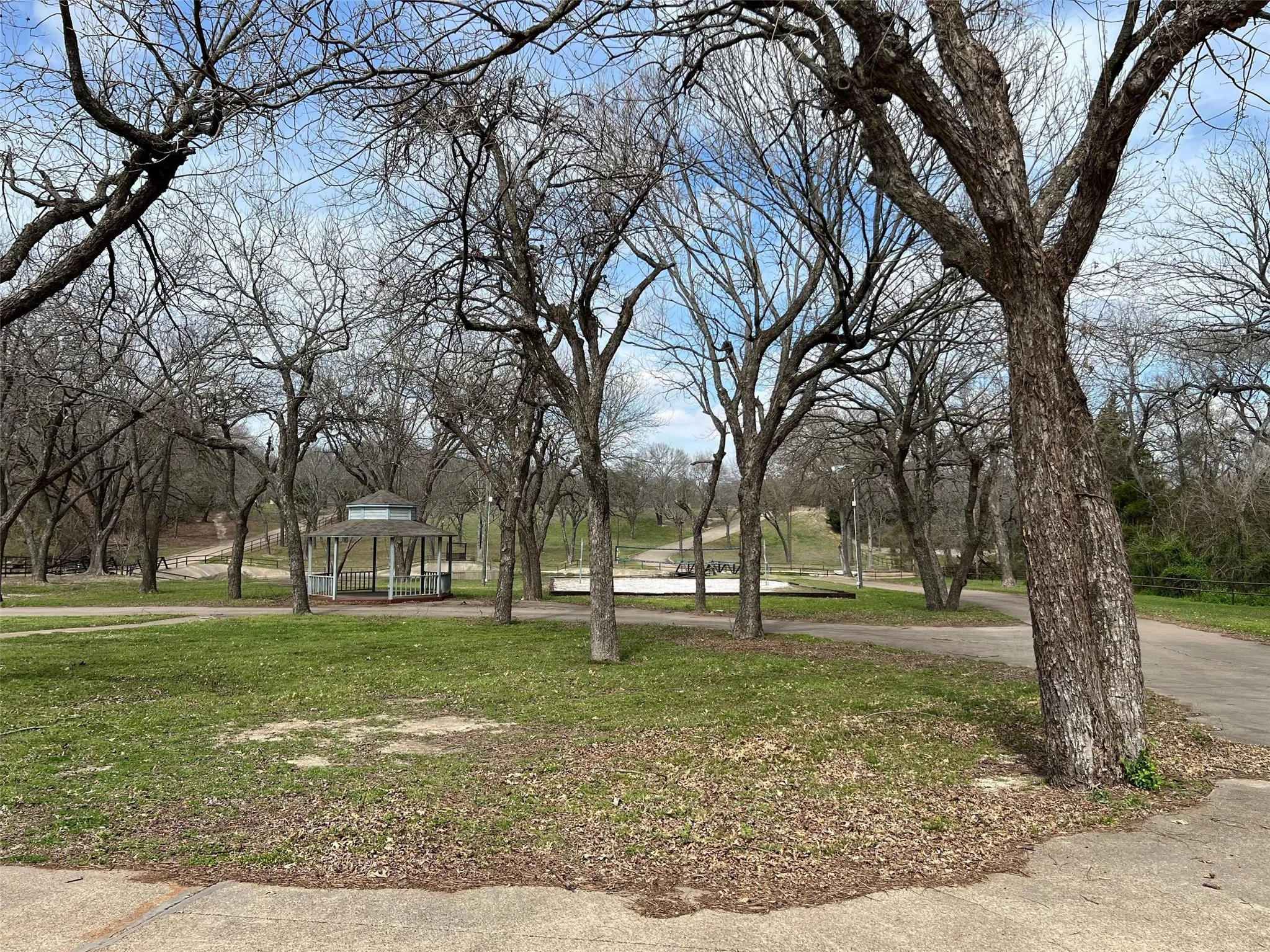 View of home's community featuring a gazebo and a lawn
