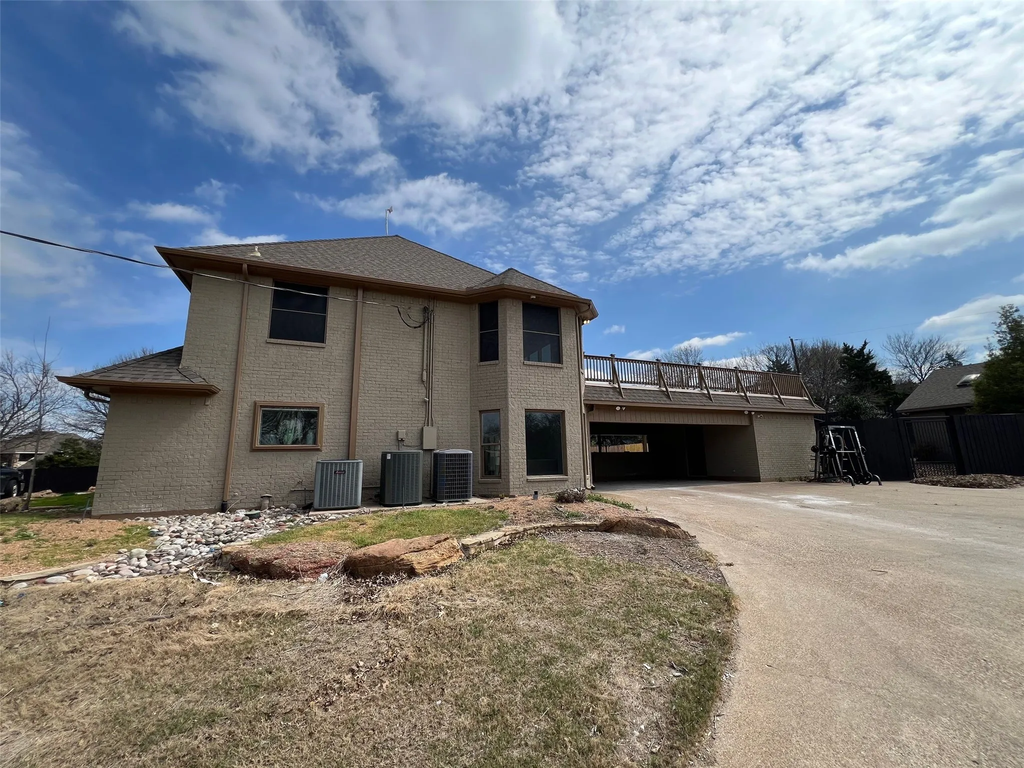 View of property exterior with central AC