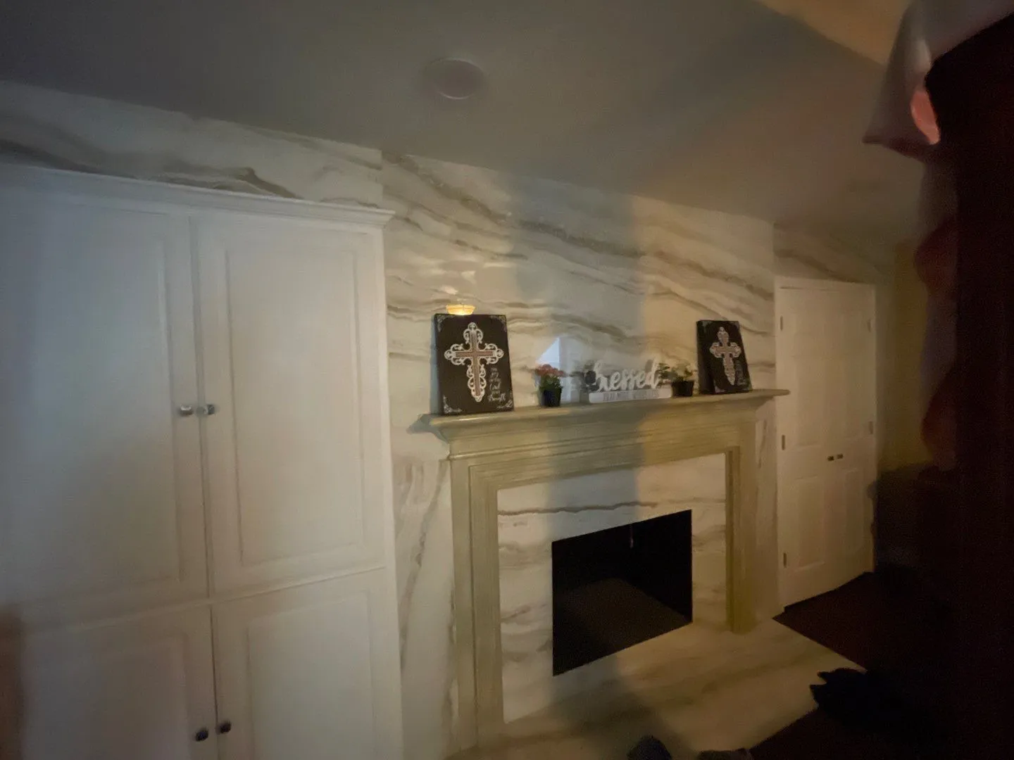 Details featuring a high end fireplace