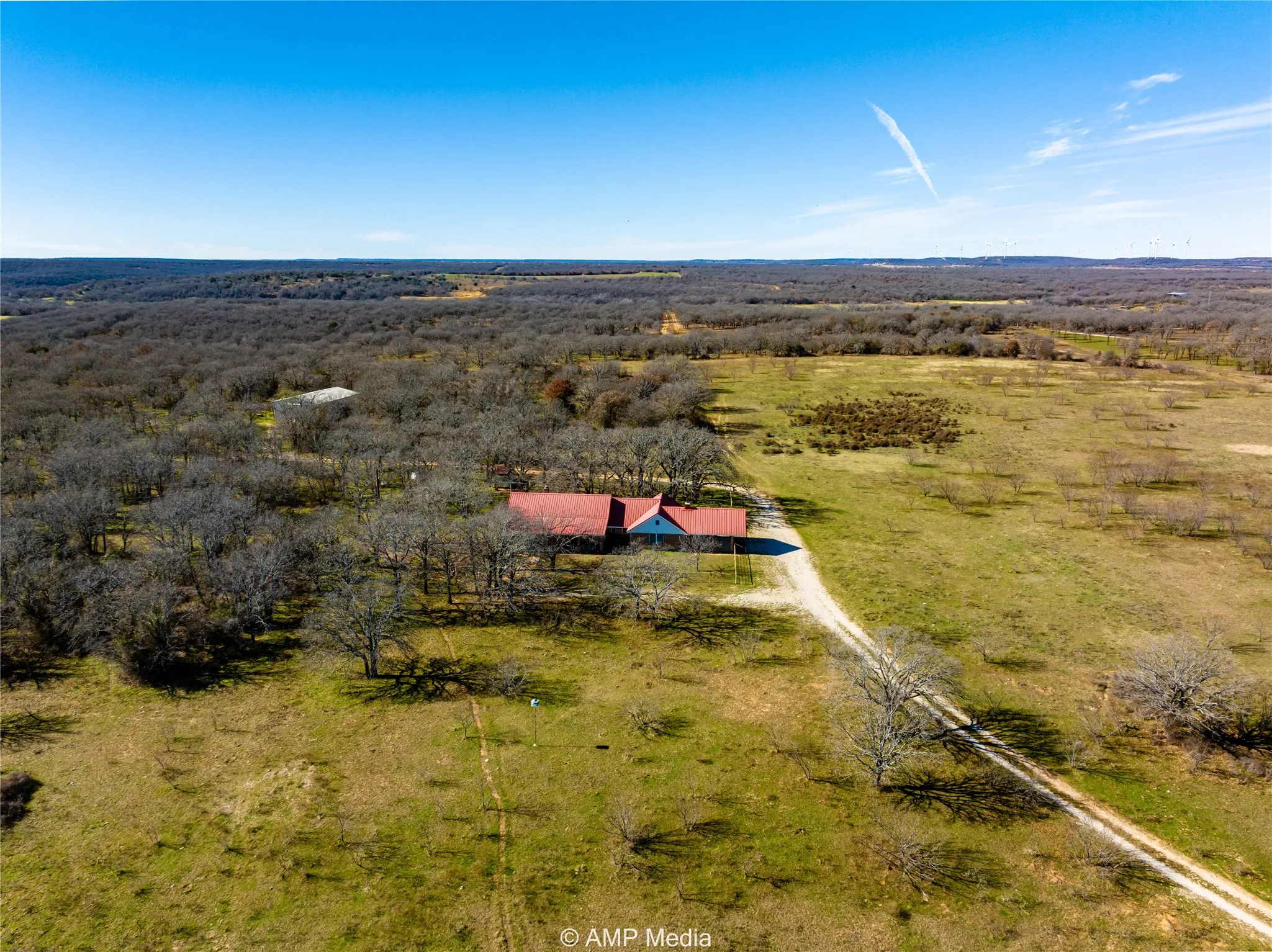 Birds eye view of property with a rural view