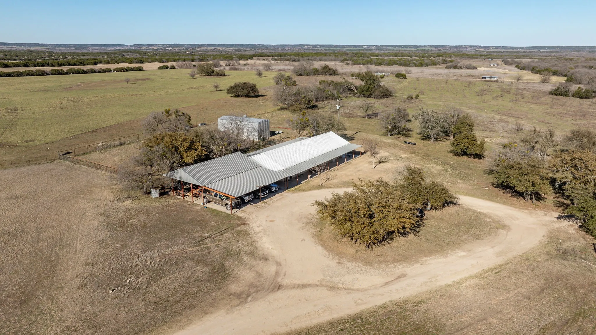 Birds eye view of property featuring a rural view