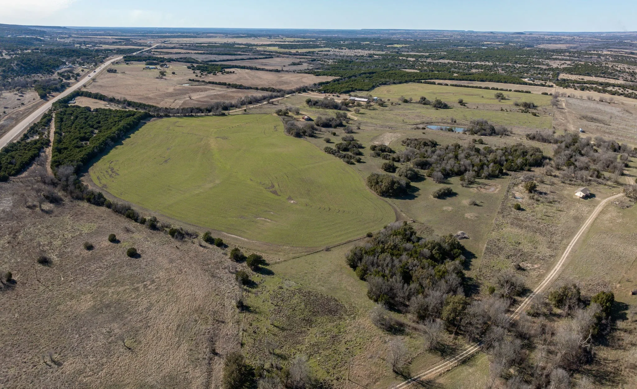 Birds eye view of property featuring a rural view