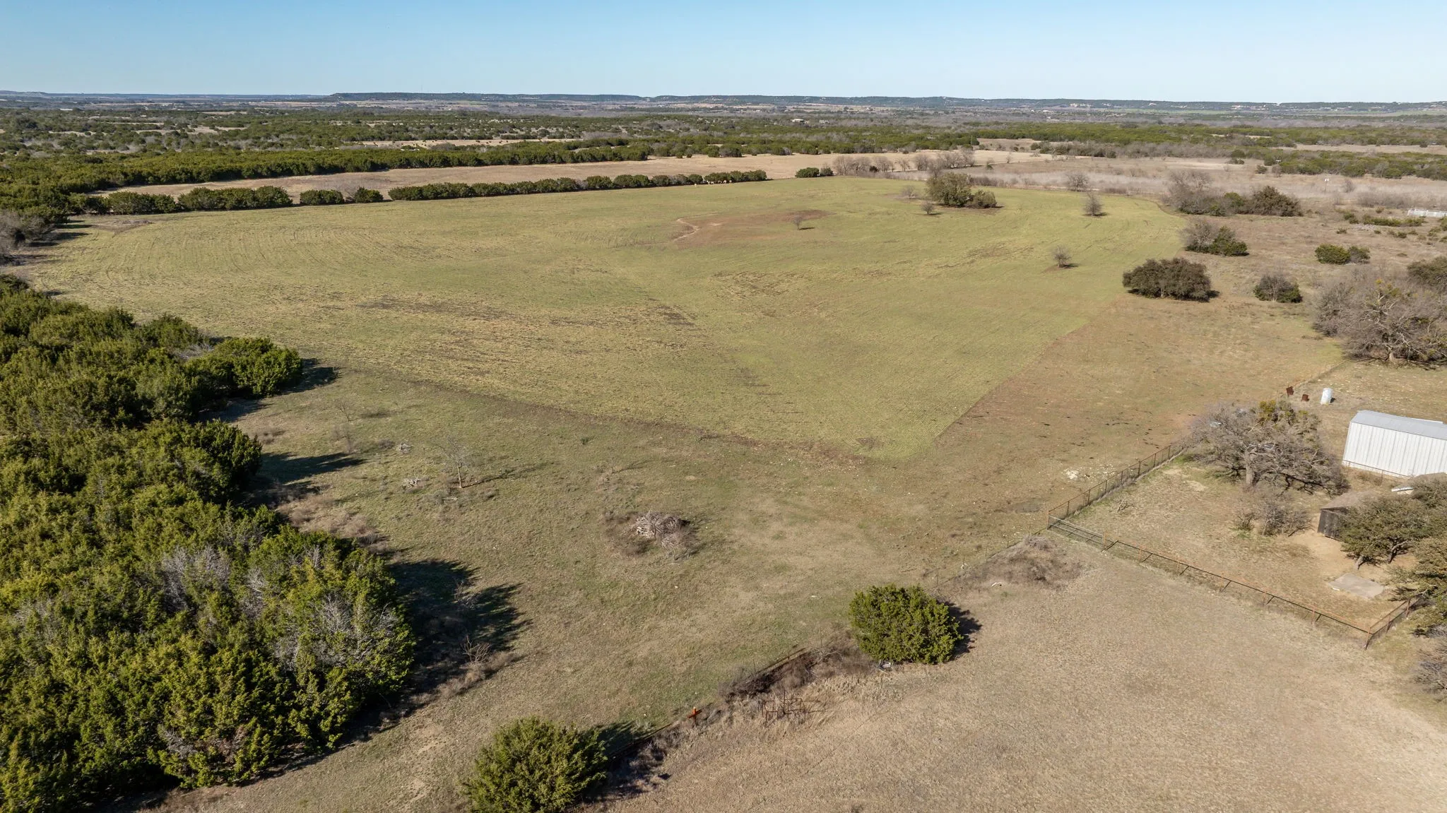 Birds eye view of property featuring a rural view