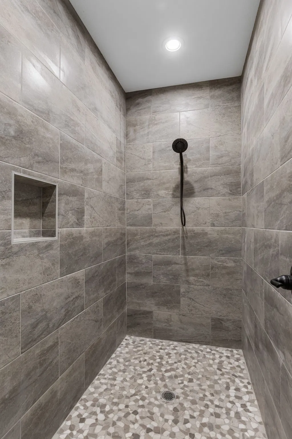 Bathroom with a tile shower