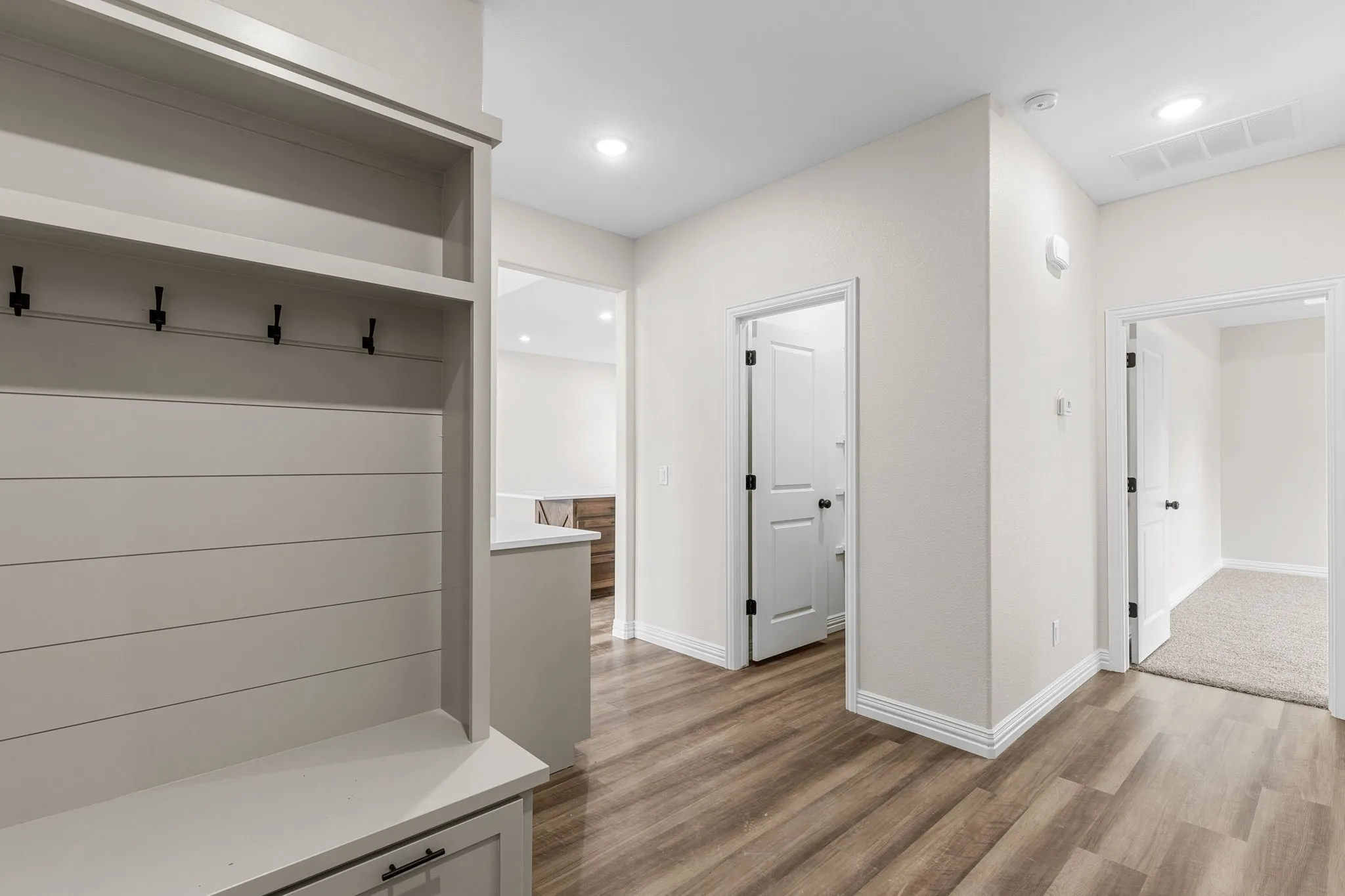 Mudroom featuring light hardwood / wood-style flooring