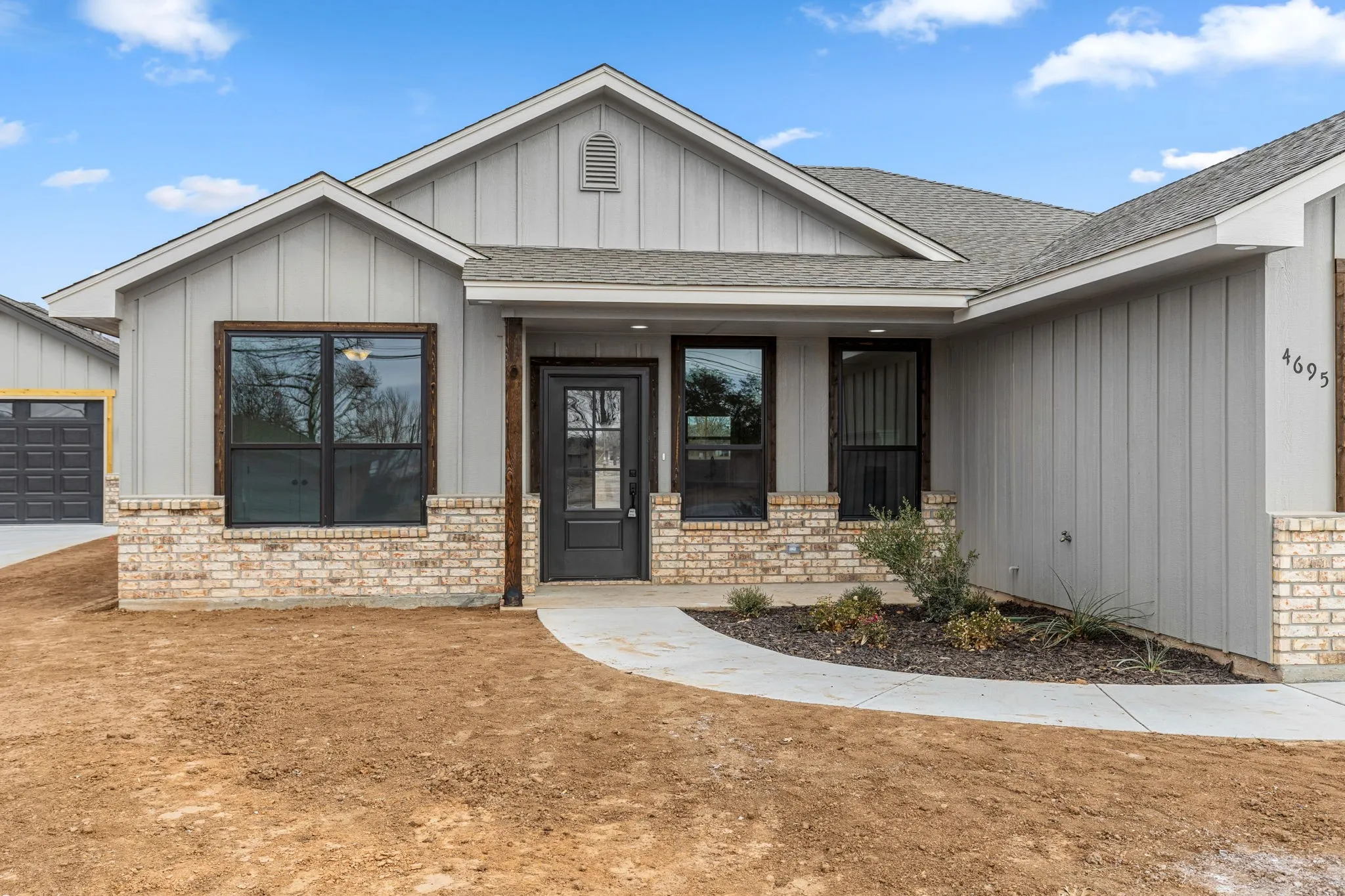 Entrance to property with a garage