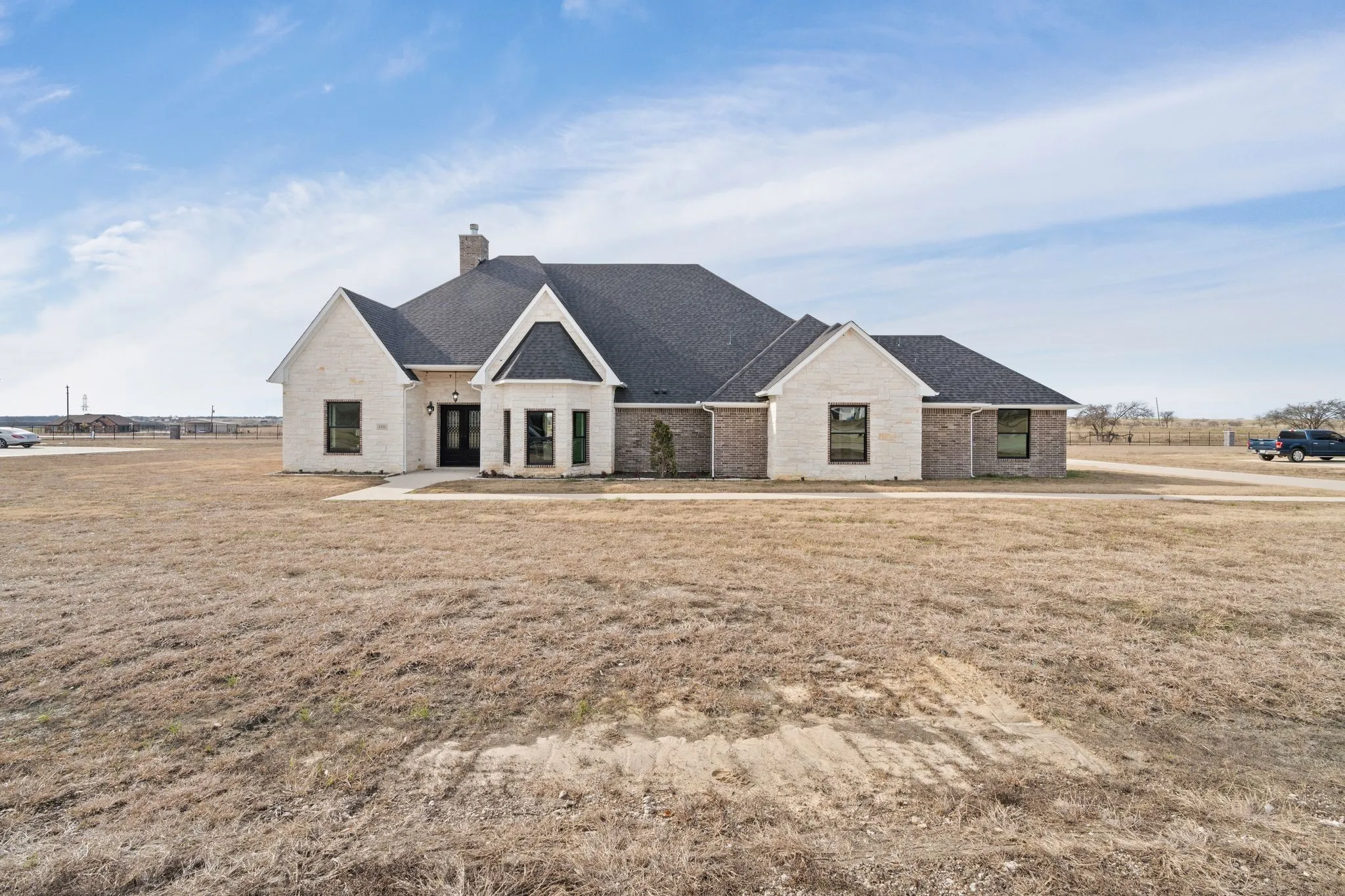 View of front facade with a front yard