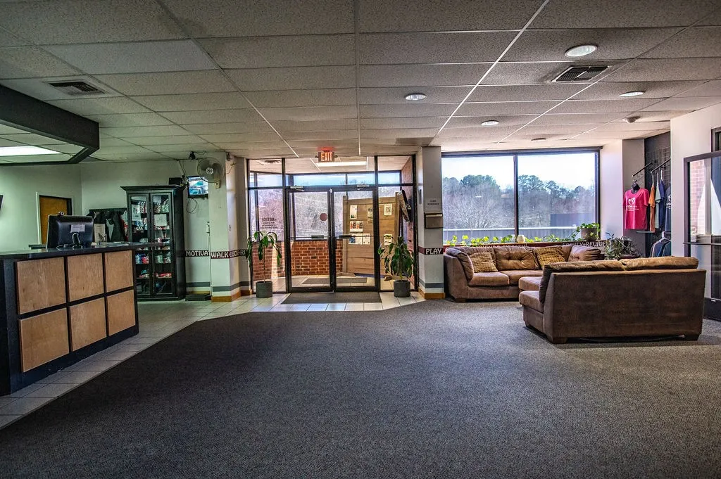 View of building lobby with lounge seating for community gathering