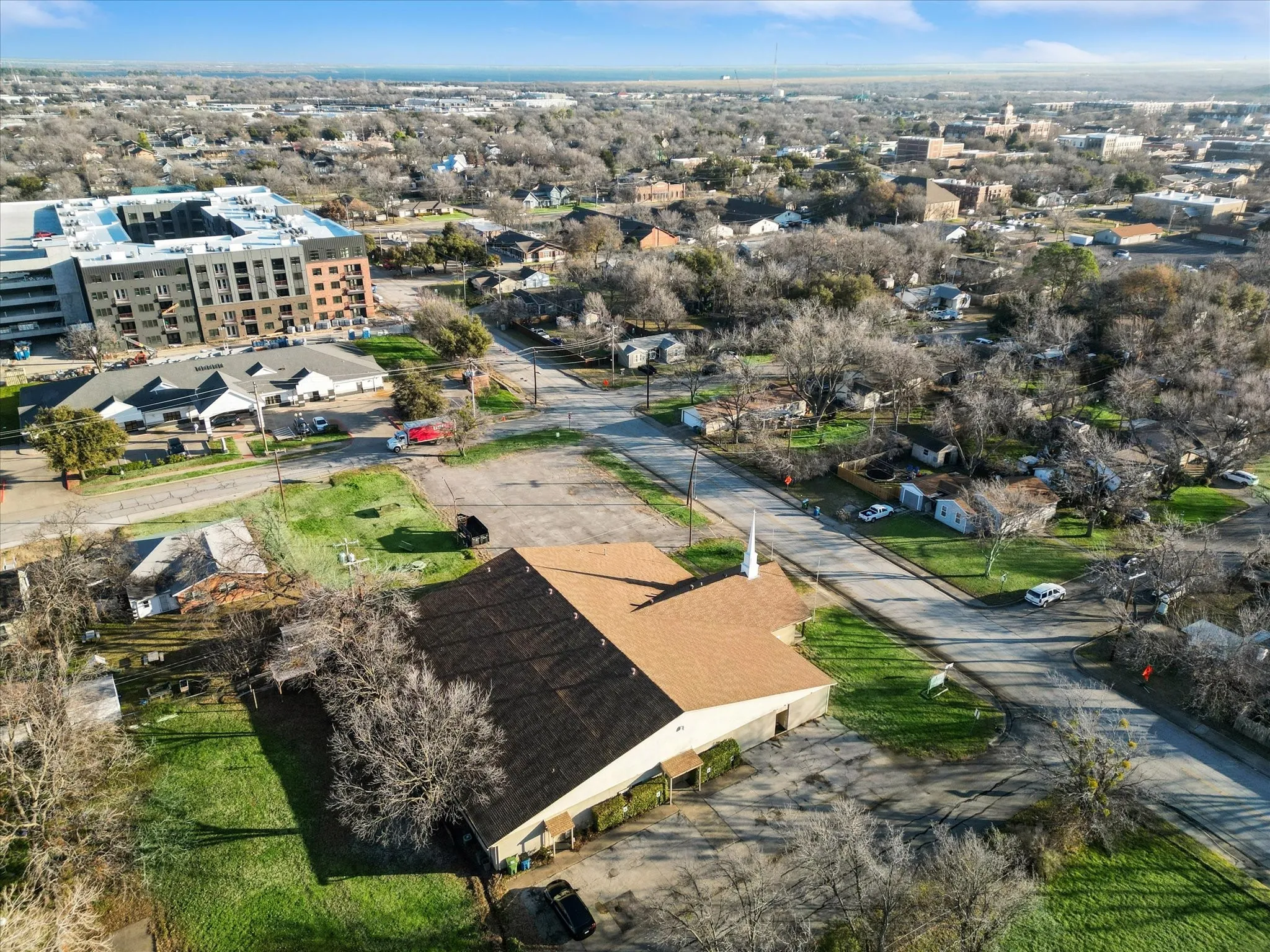 Birds eye view of property's back lot that is unimproved