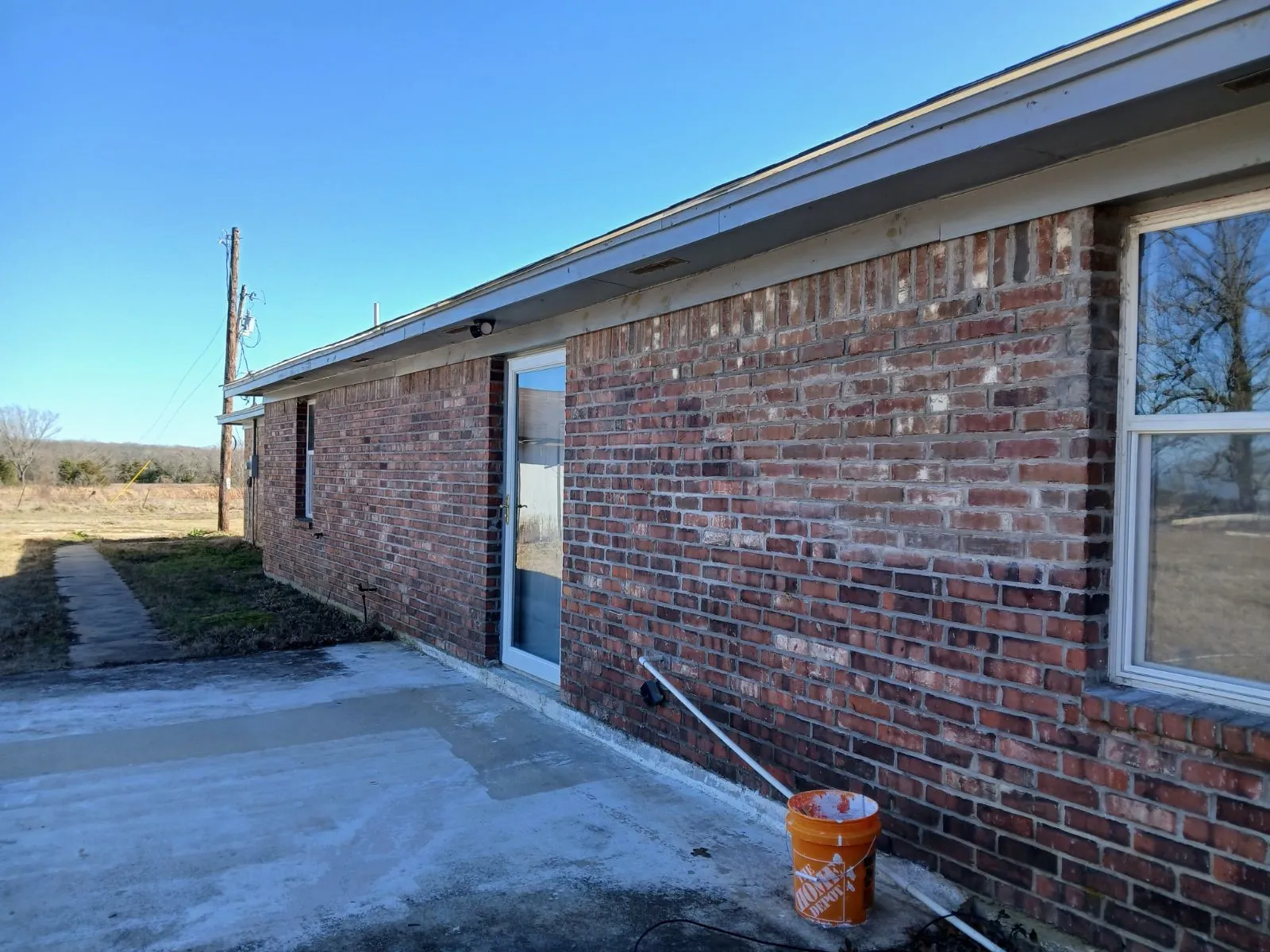 View of home's exterior with a patio