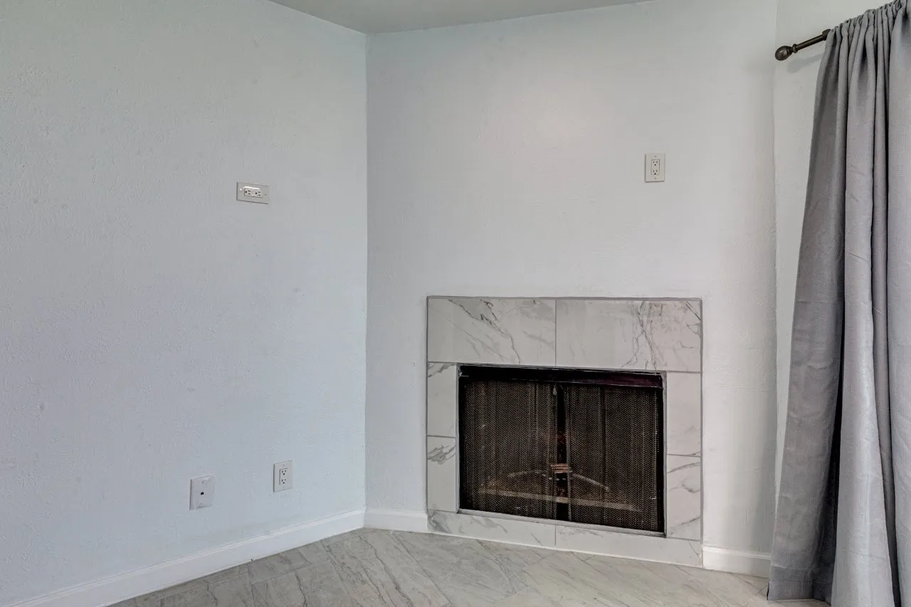Interior details featuring a premium fireplace