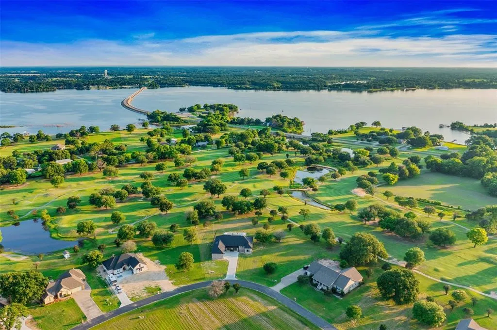 Aerial view with a water view and a rural view