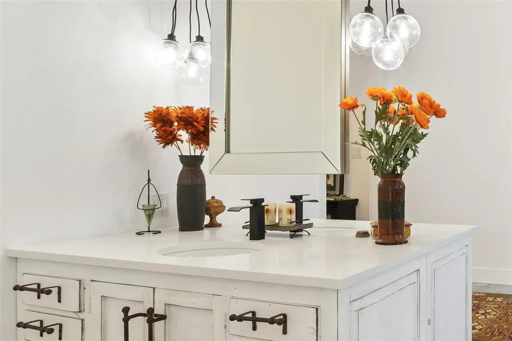 Bar featuring sink and hanging light fixtures