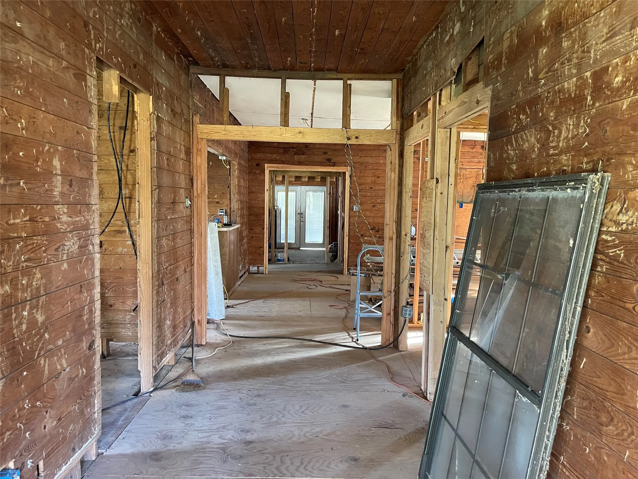 Hall featuring wooden ceiling