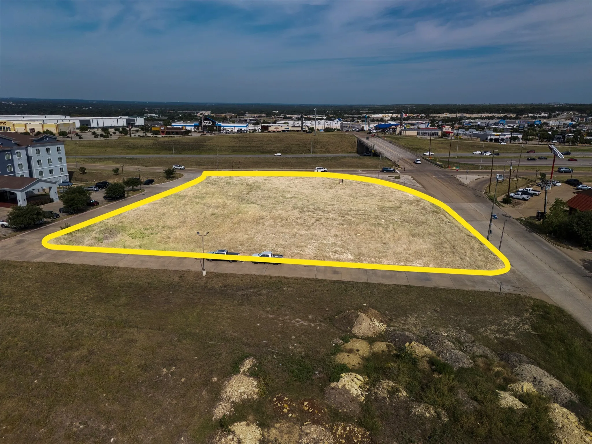 Aerial view of property's location with property parcel outlined