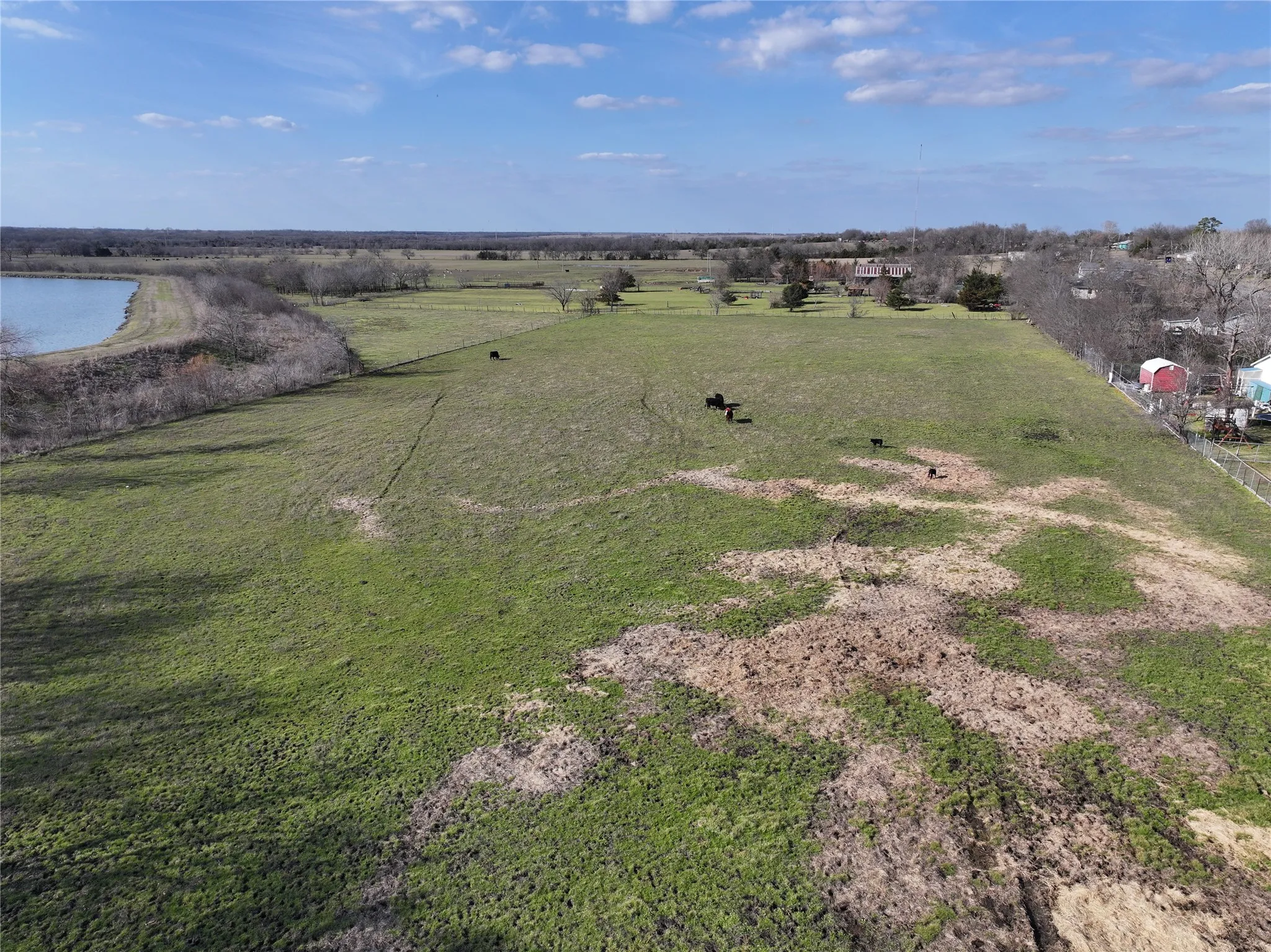Bird's eye view with a rural view and a water view