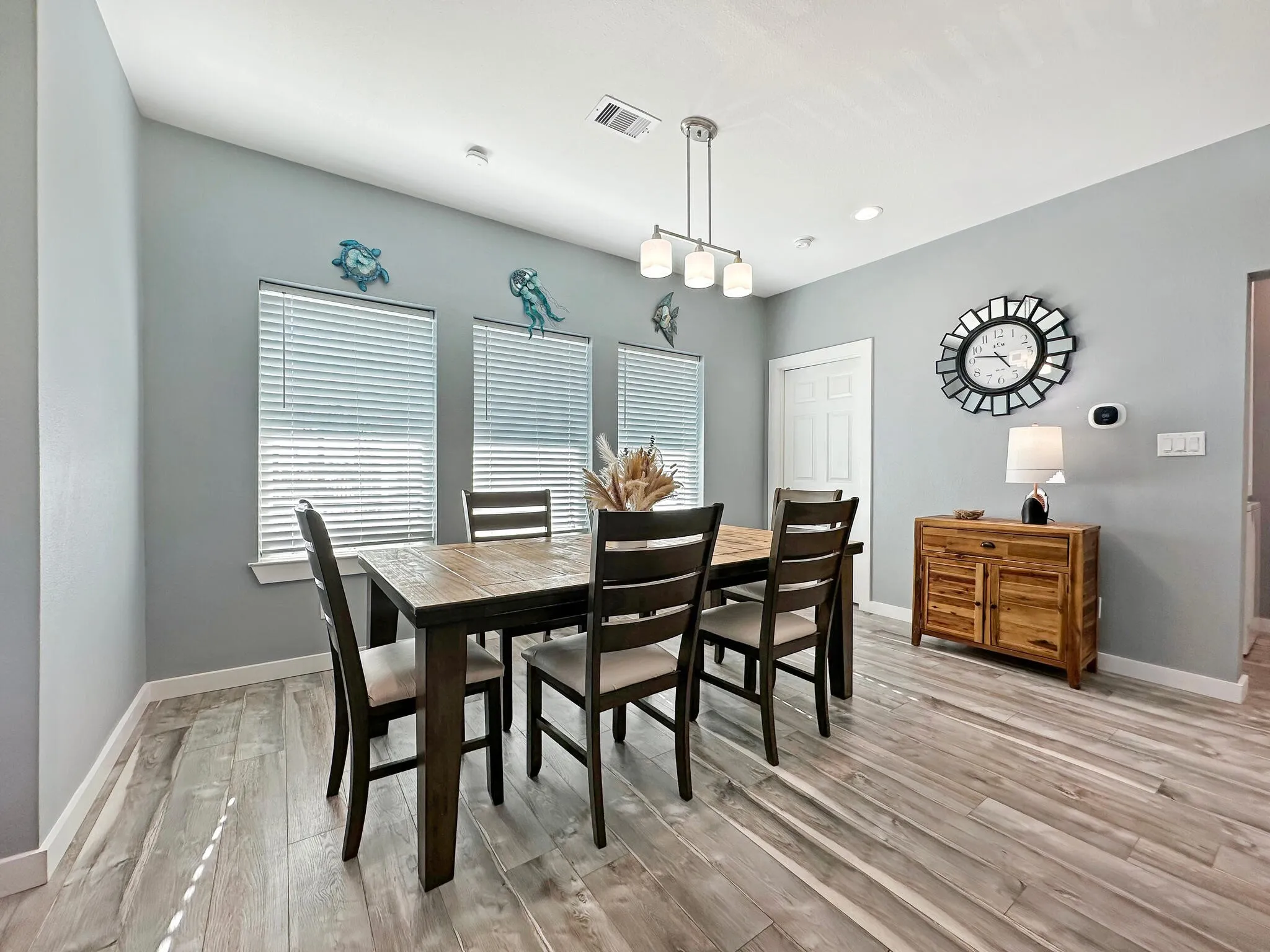 Dining area featuring light wood-style floors, and baseboards