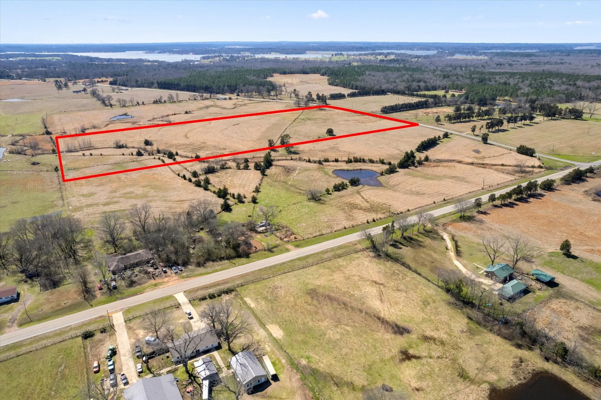 Birds eye view of property featuring a rural view