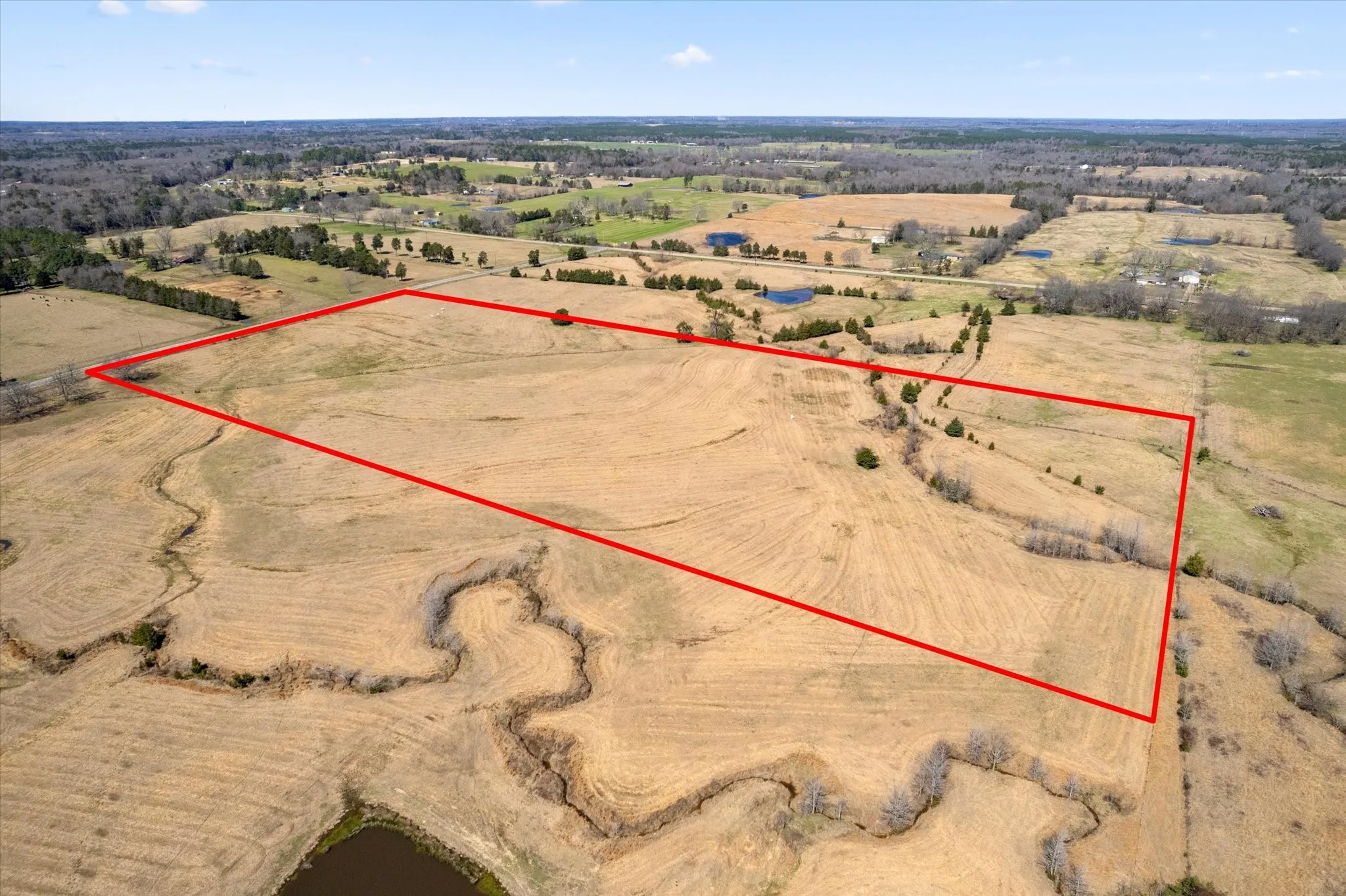 Birds eye view of property featuring a rural view