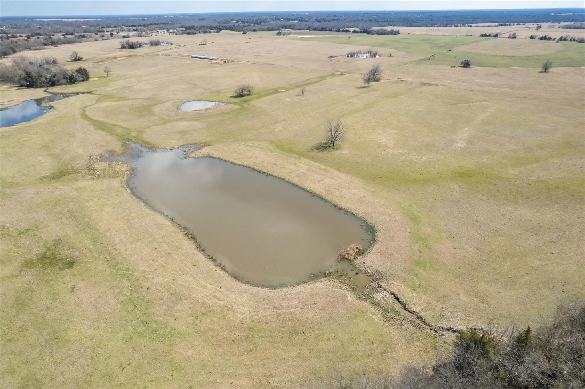 Aerial view featuring a water view and a rural view