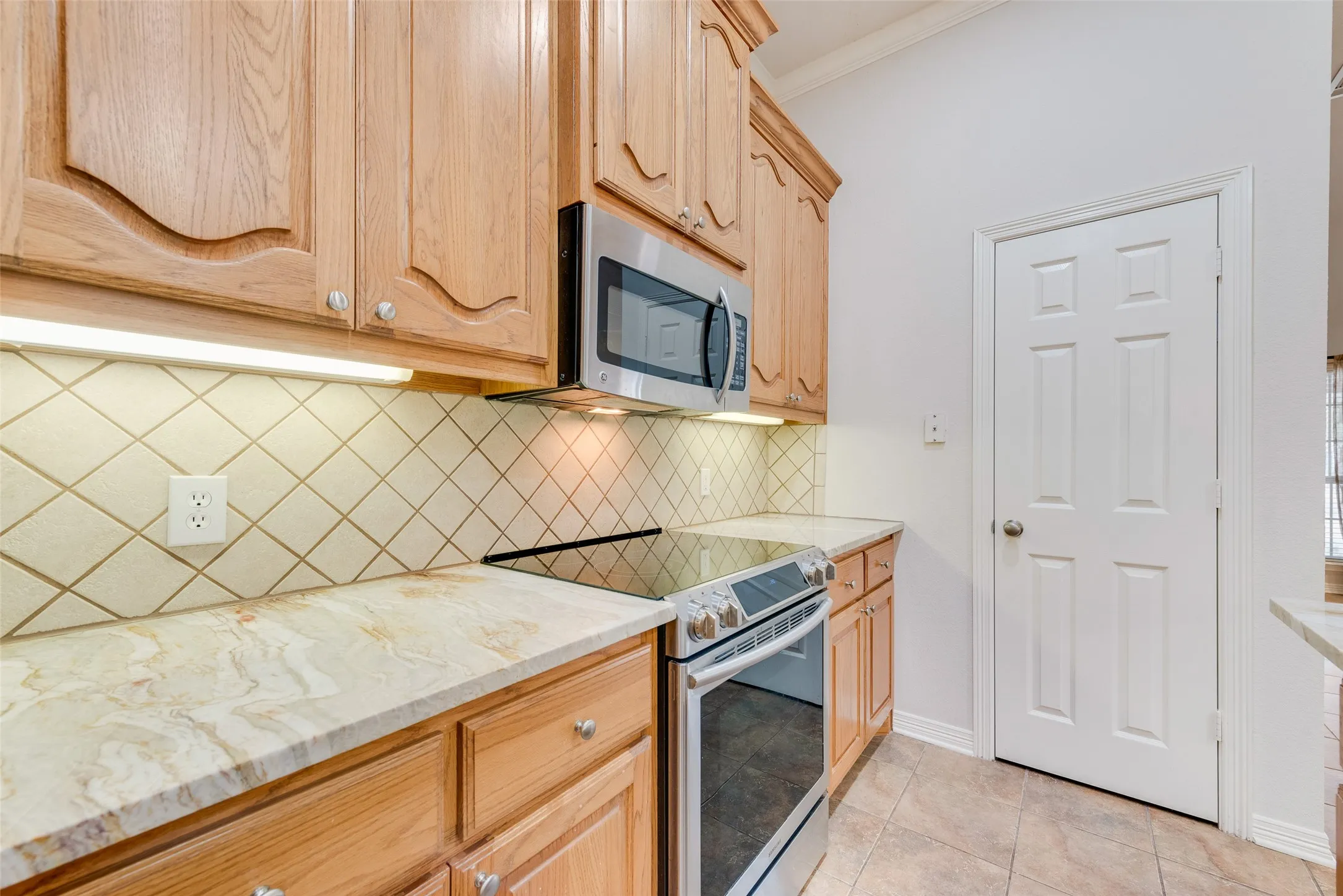 Kitchen also has an electric range