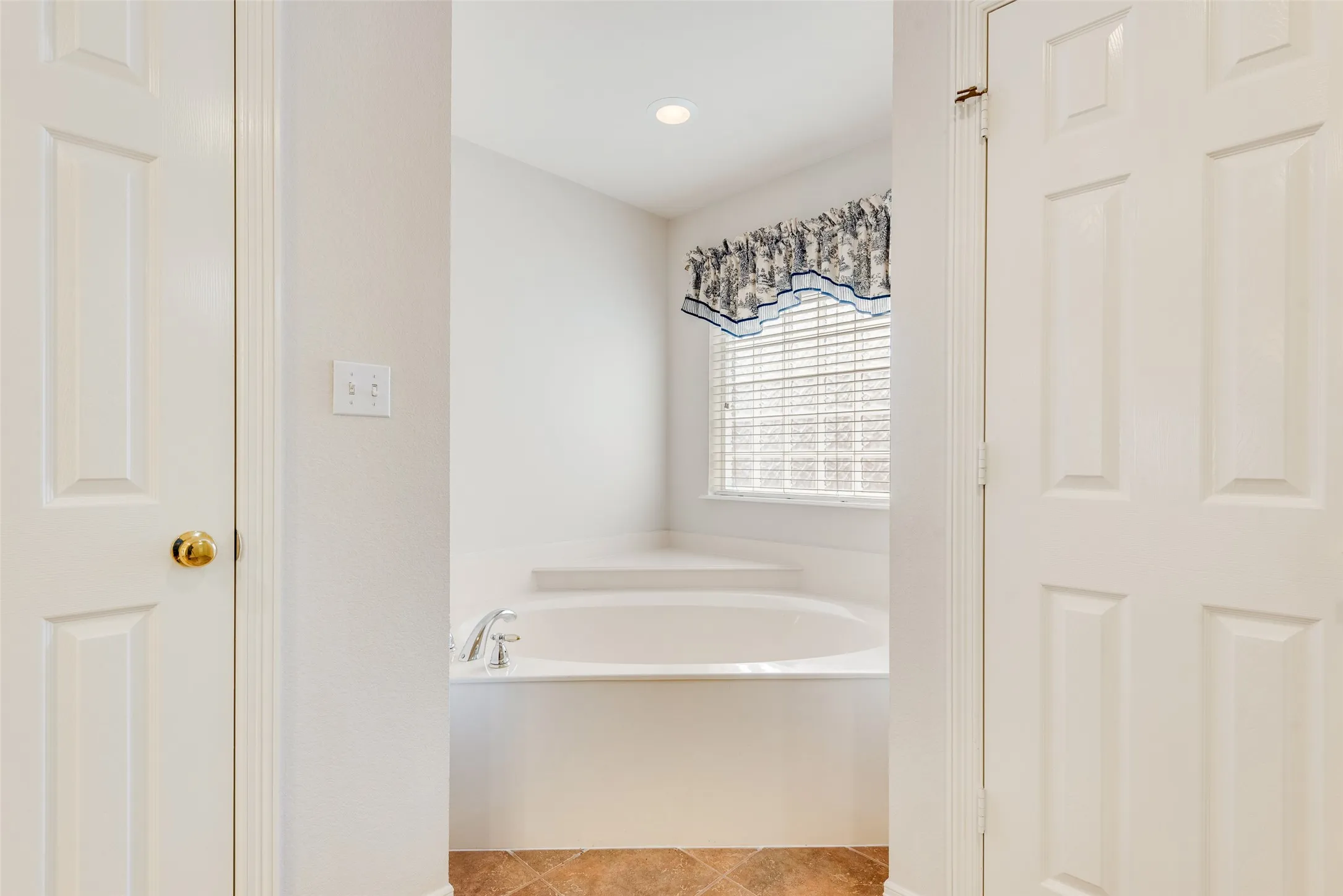 Separate tub in primary bathroom