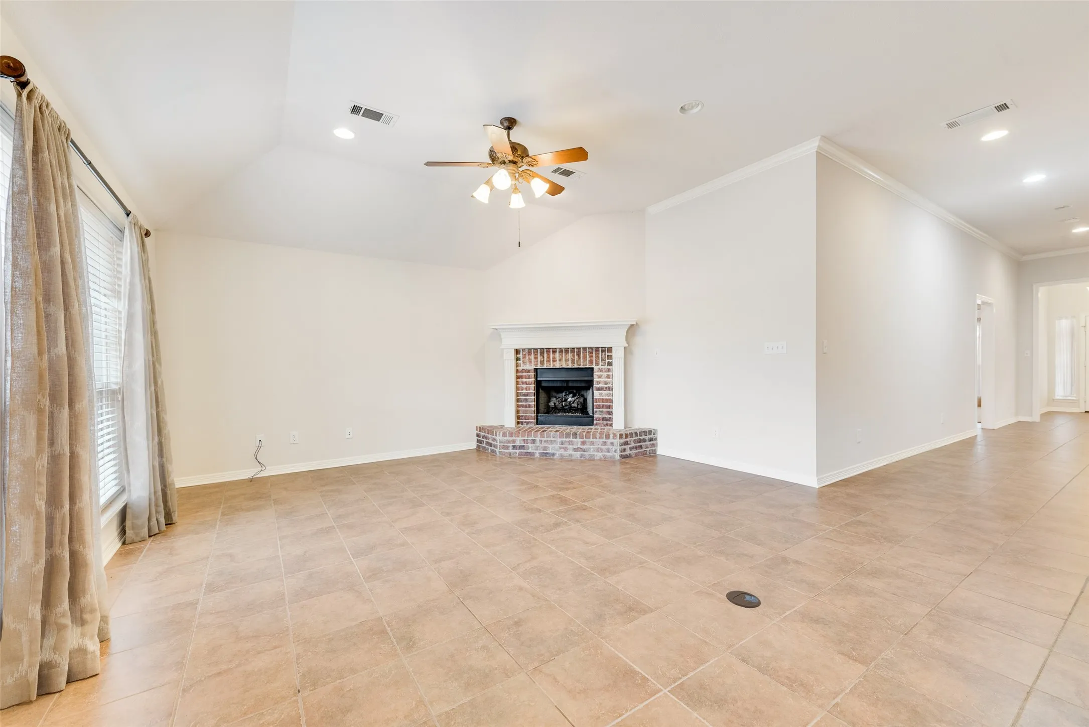 Ceramic tile flooring with a gas fireplace