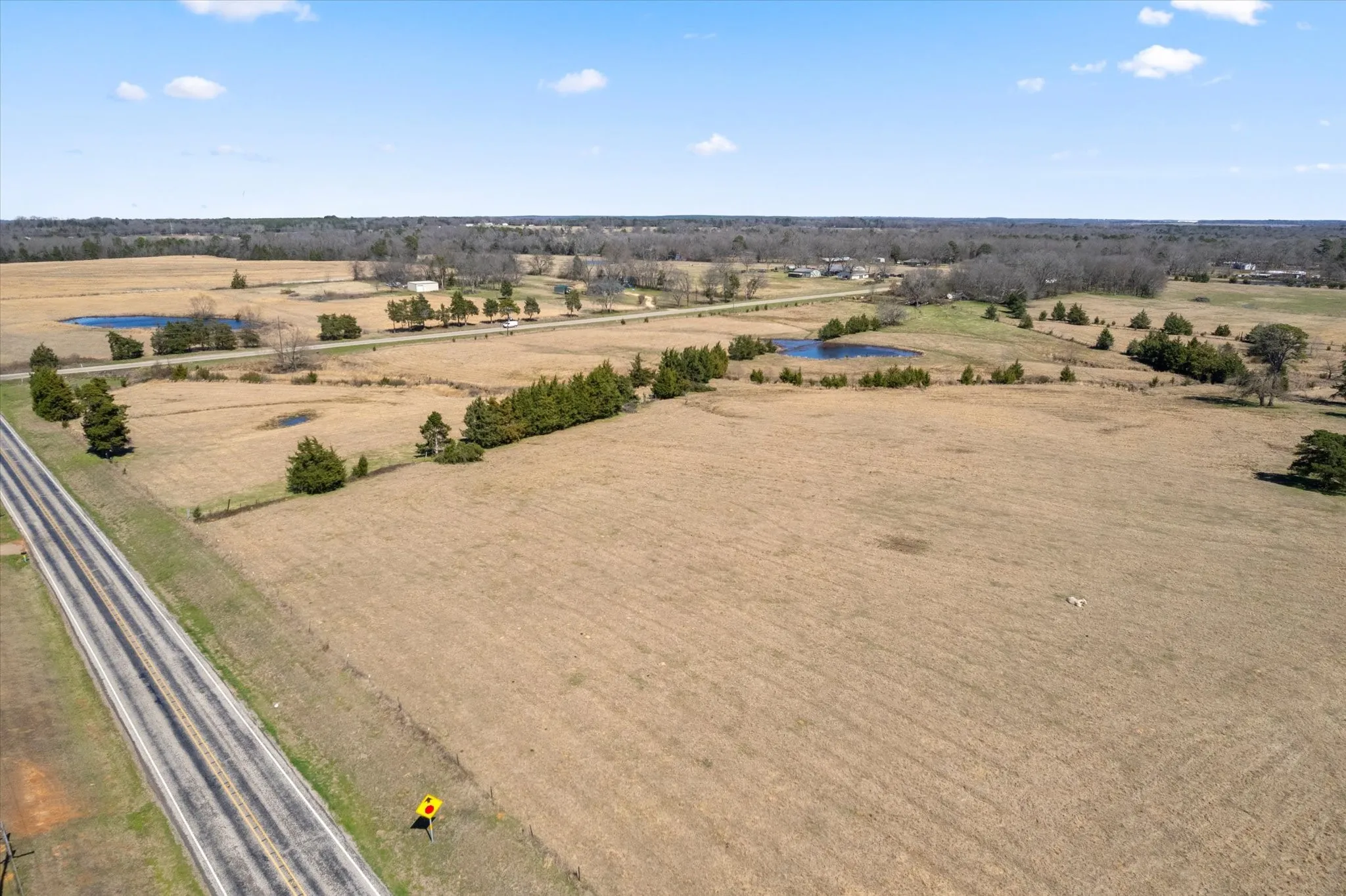 Birds eye view of property with a rural view