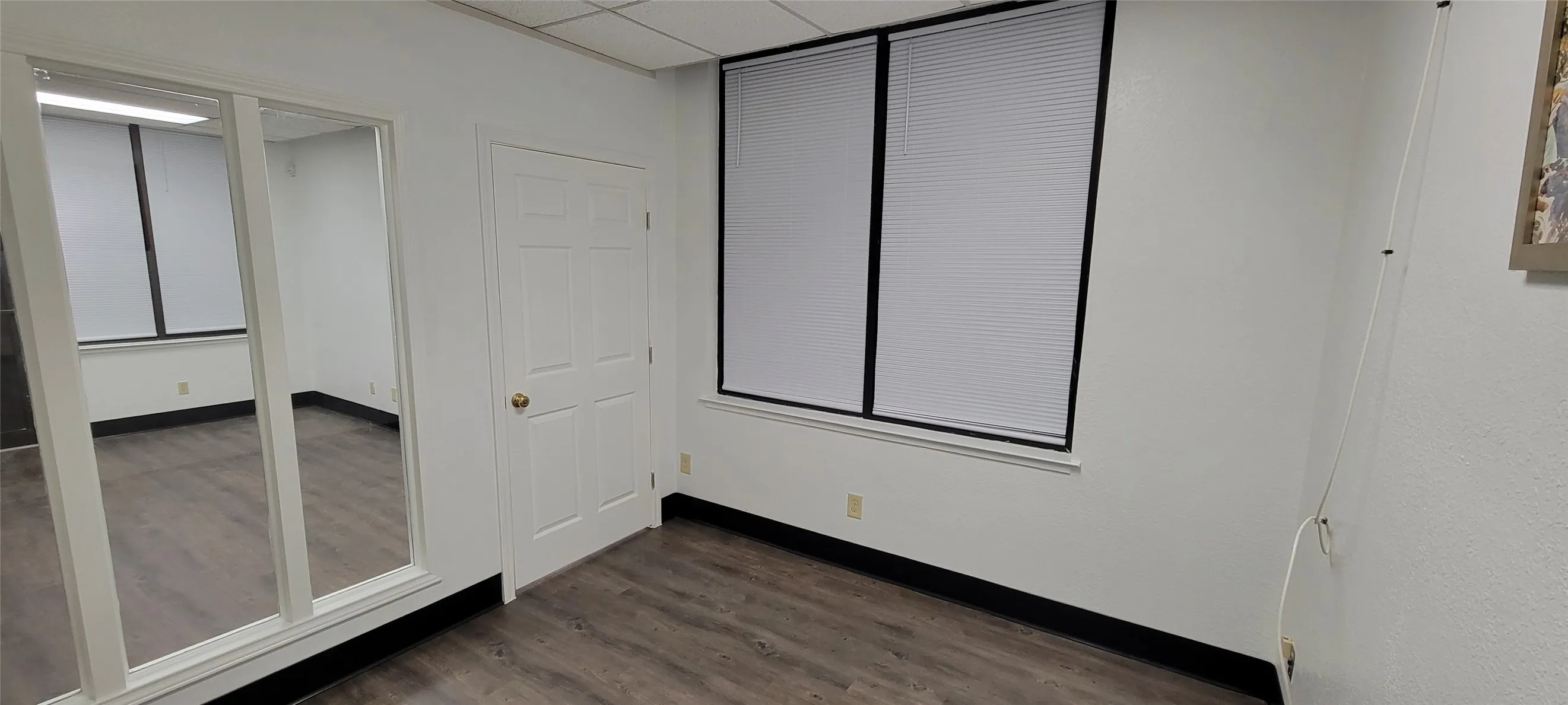 Back office convenient to kitchenette for use as break room or meeting