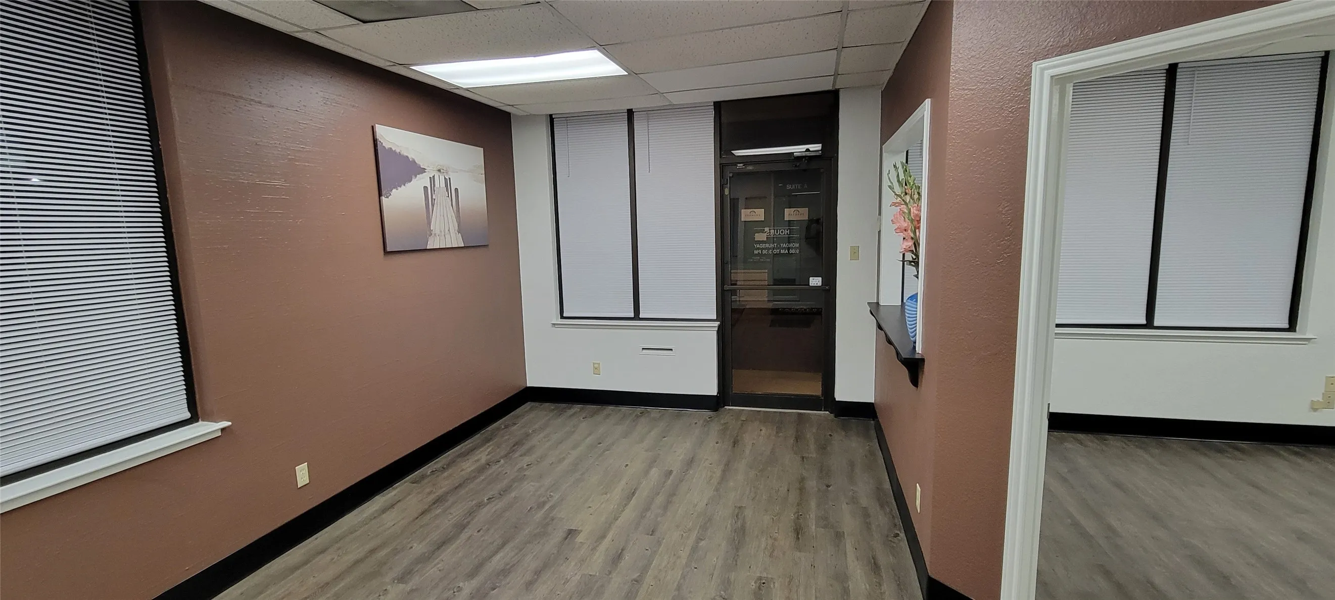 Reception with large waiting area and guest sign in desk