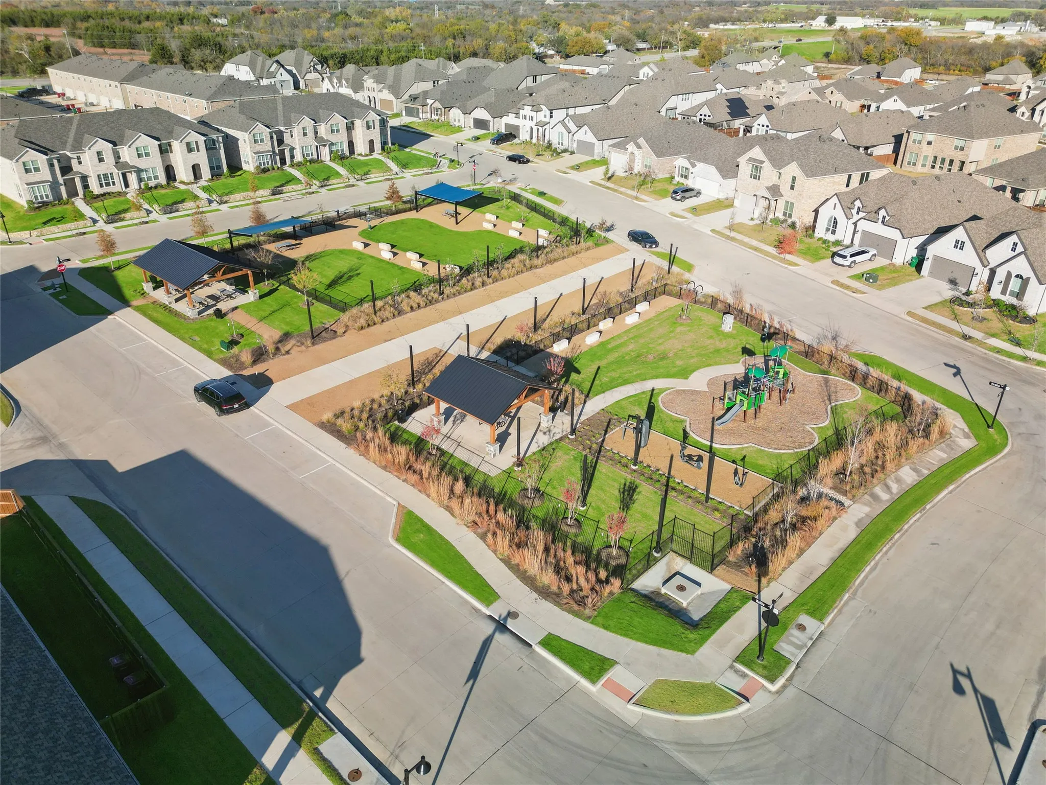 Aerial view of residential area featuring a recreational park