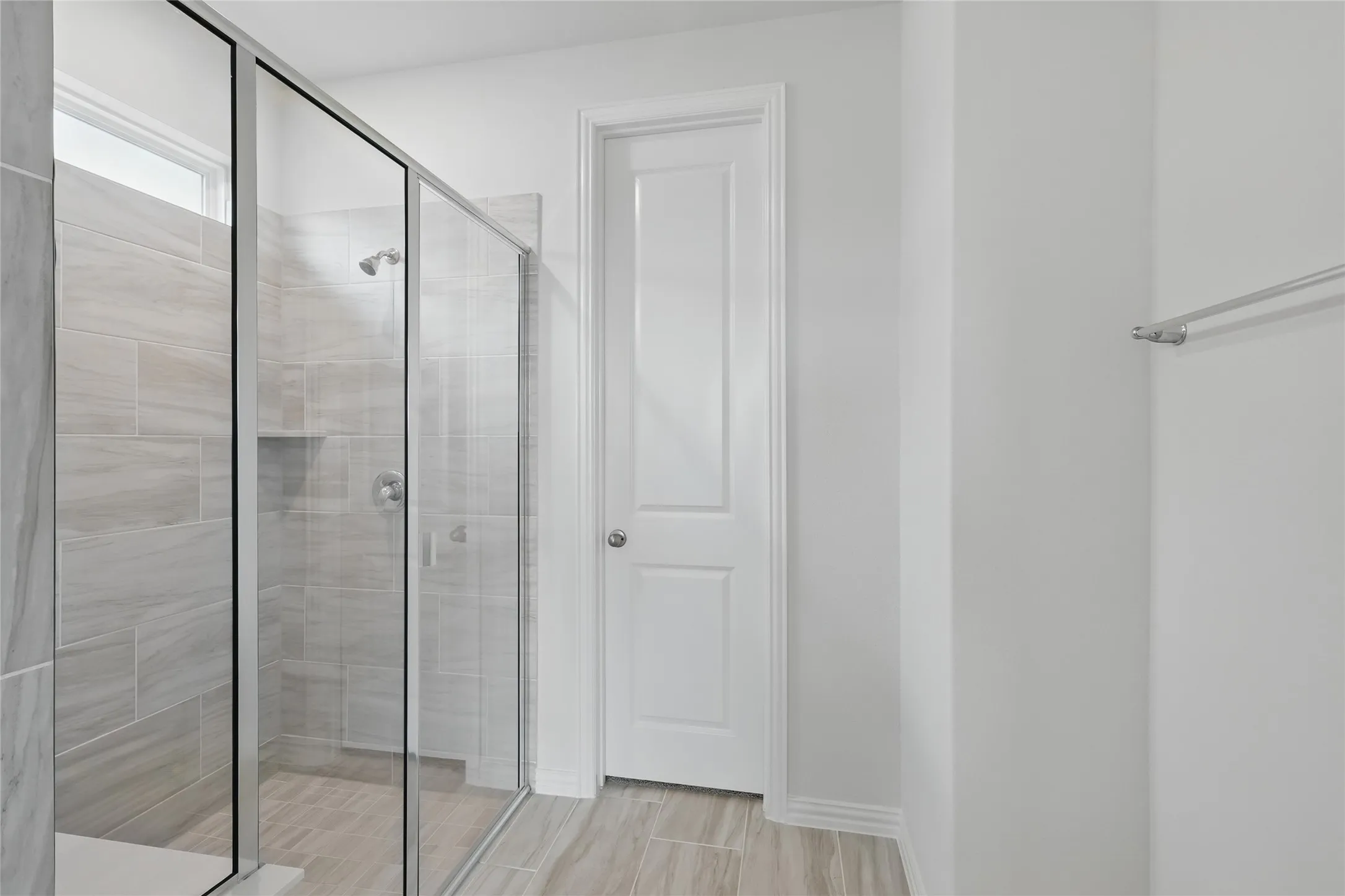 Bathroom featuring a shower stall