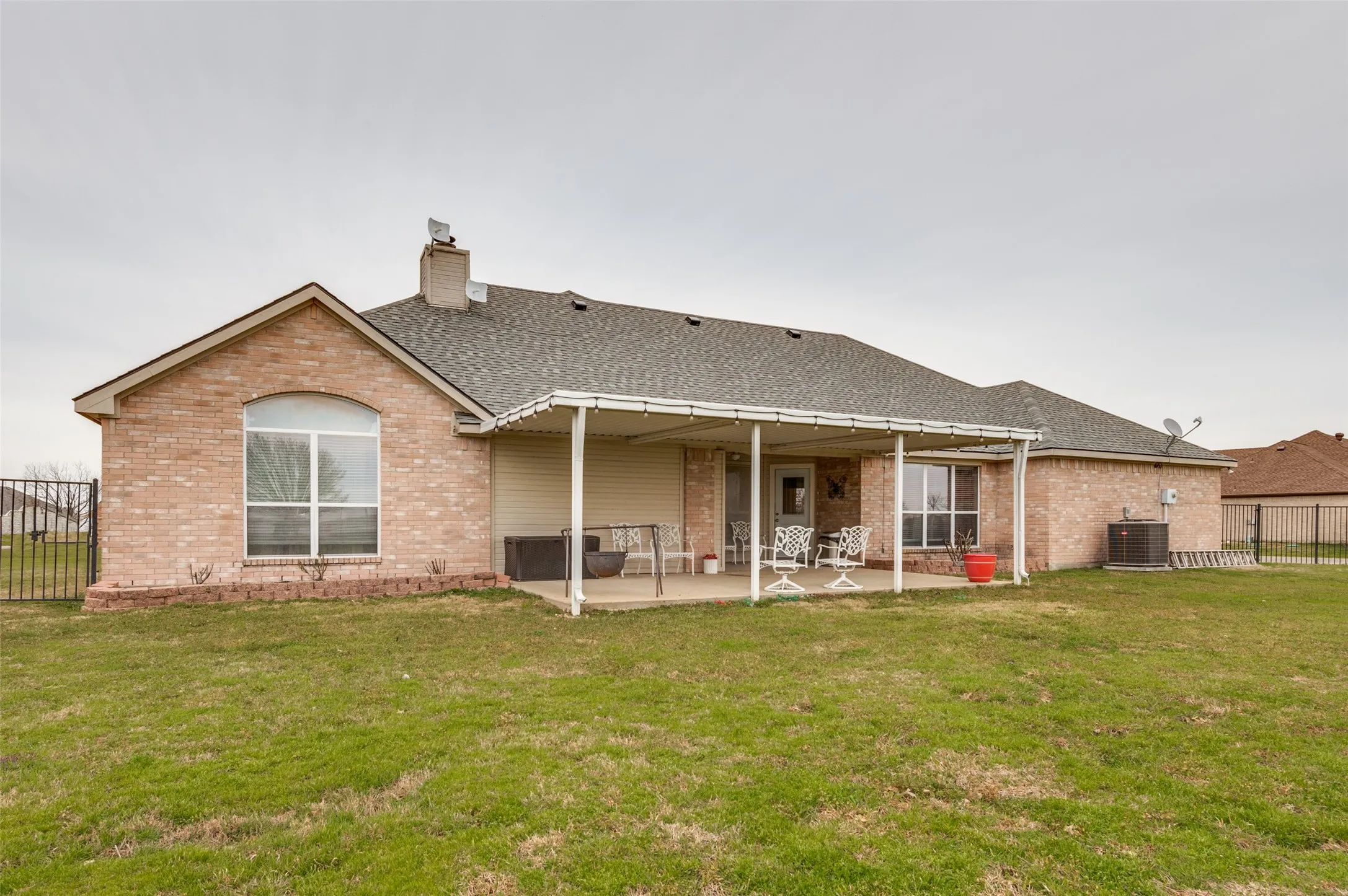 Rear view of house and patio