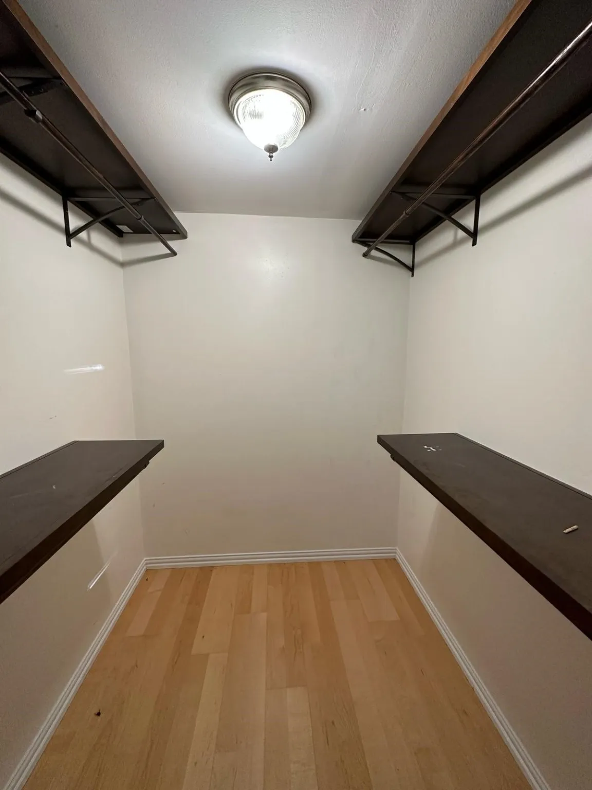  Barndo Walk in closet featuring light wood finished floors