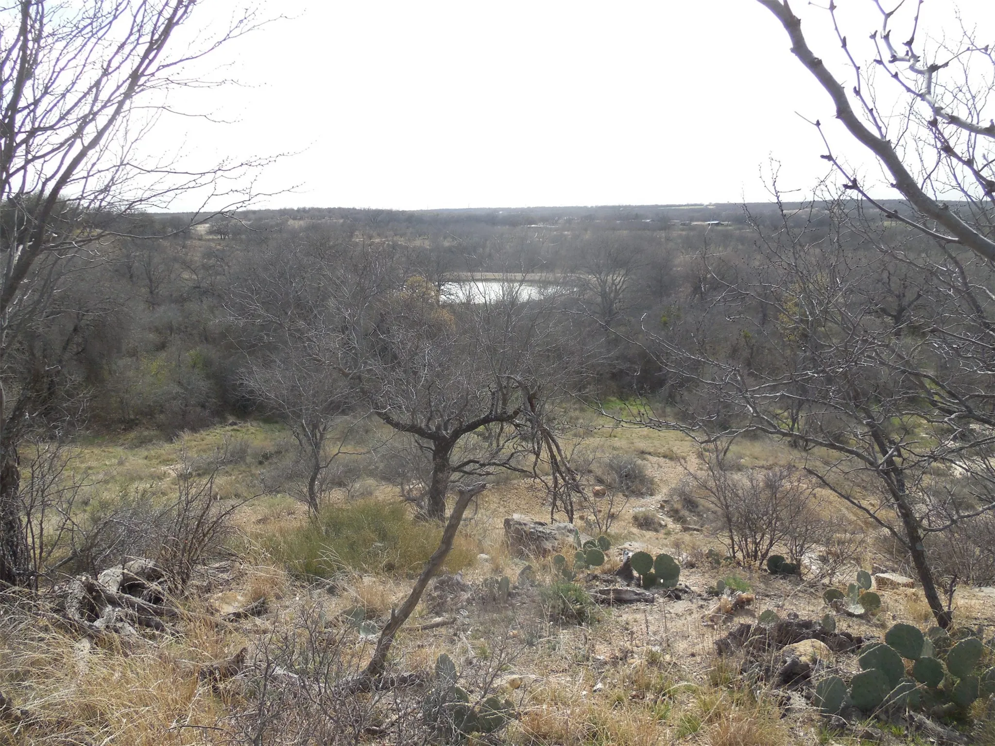 View of large tank from top of hill