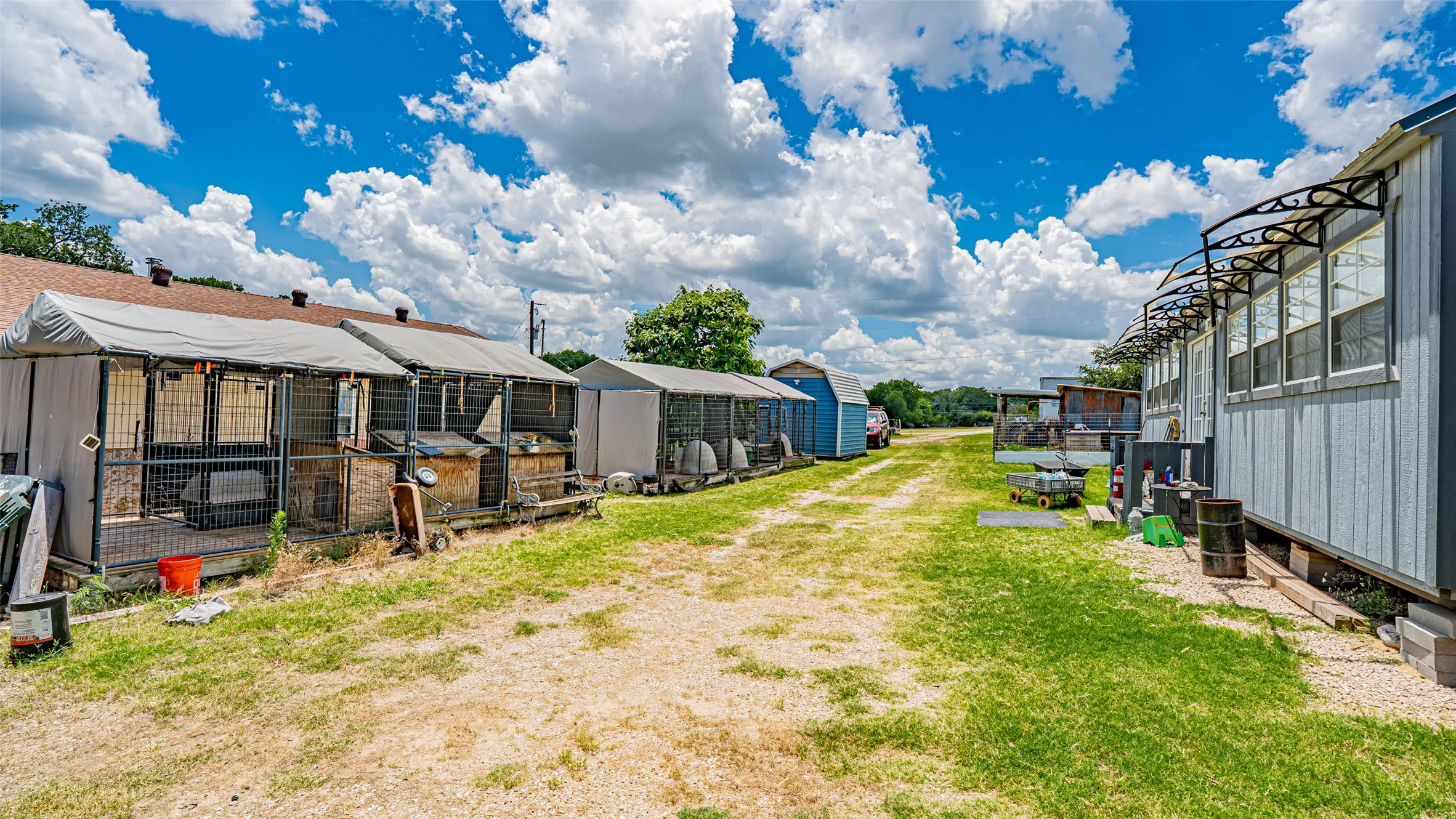View of yard with an outbuilding and exterior structure