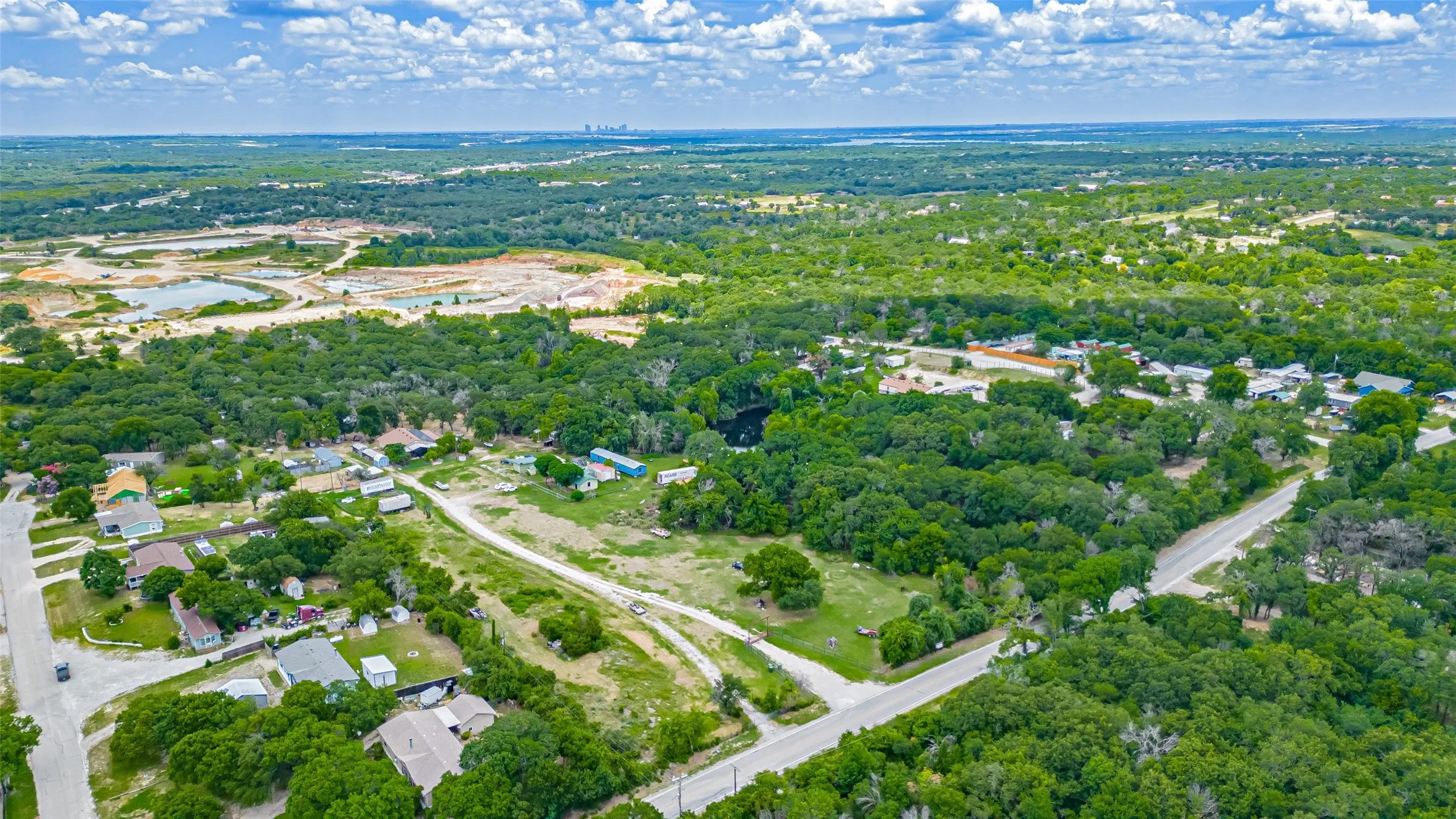 Aerial overview of property's location featuring a large body of water