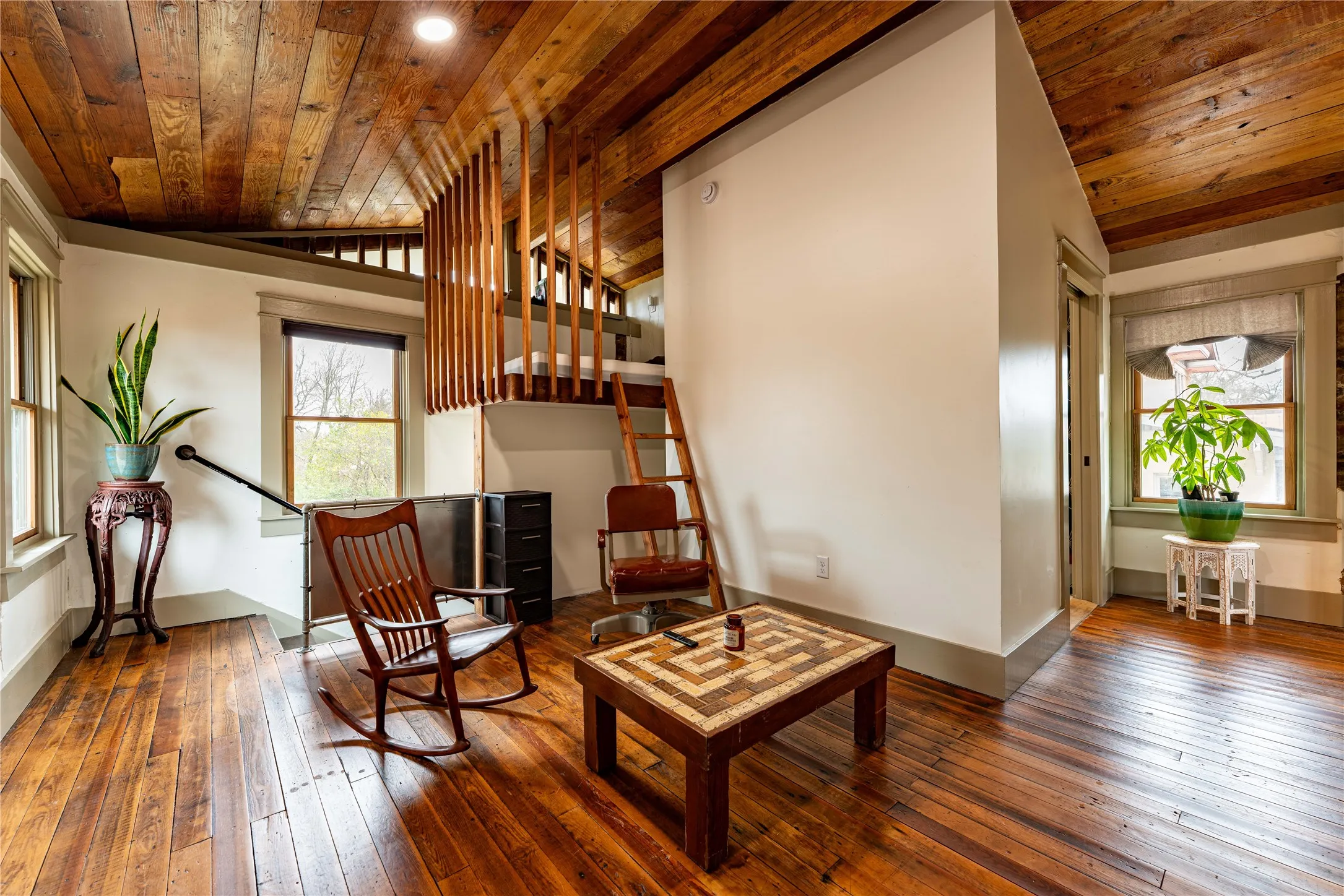 Sitting room featuring wood ceiling, lofted ceiling, and hardwood / wood-style floors