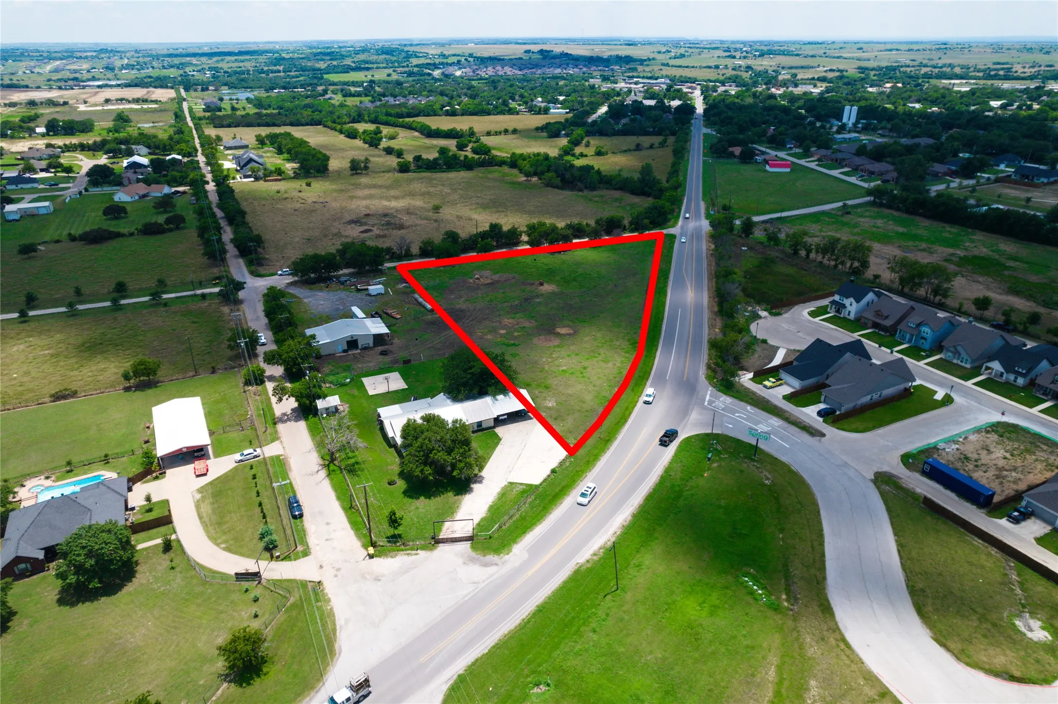 Drone / aerial view featuring a residential view and a rural view