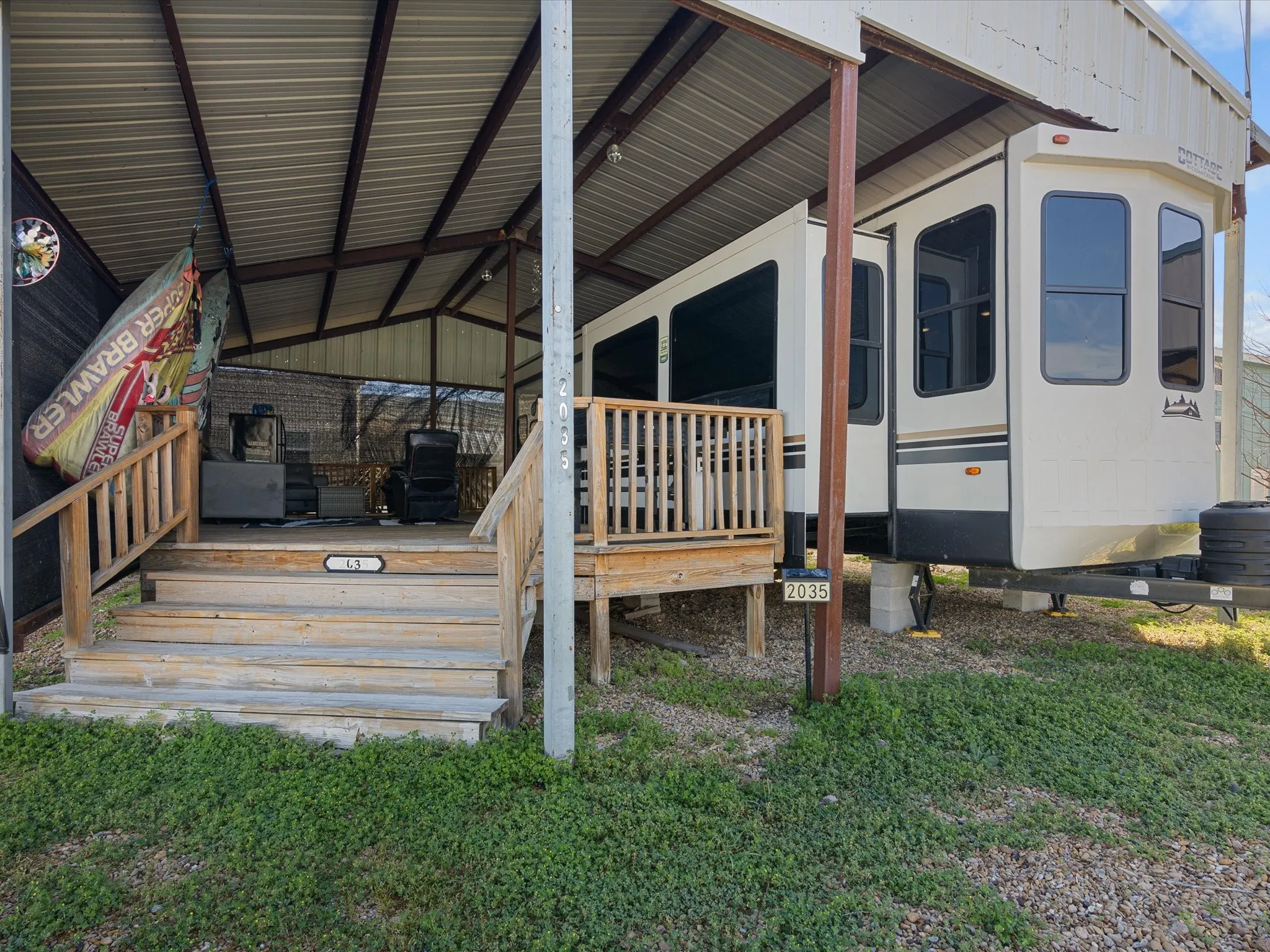View of side with a porch - Park Model not included