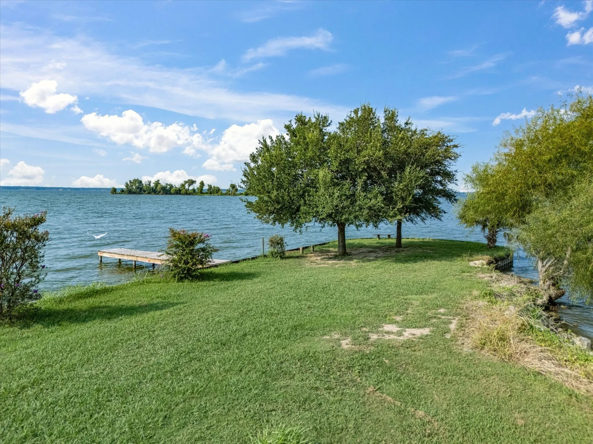 View of grassy yard featuring a water view
