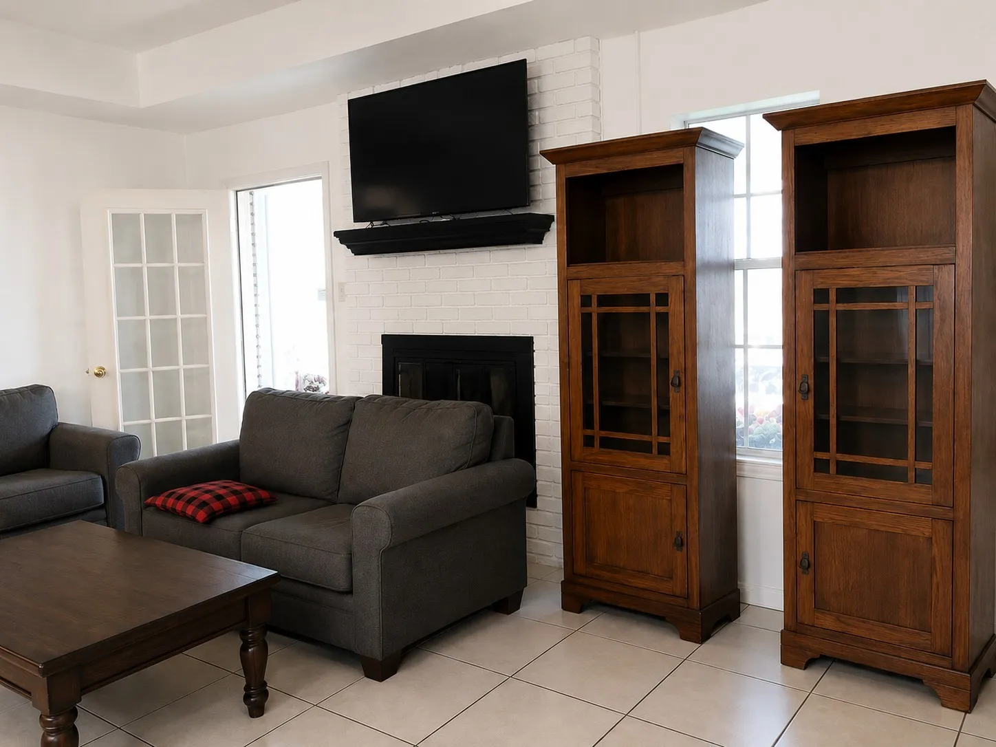 fireplace and tile patterned flooring