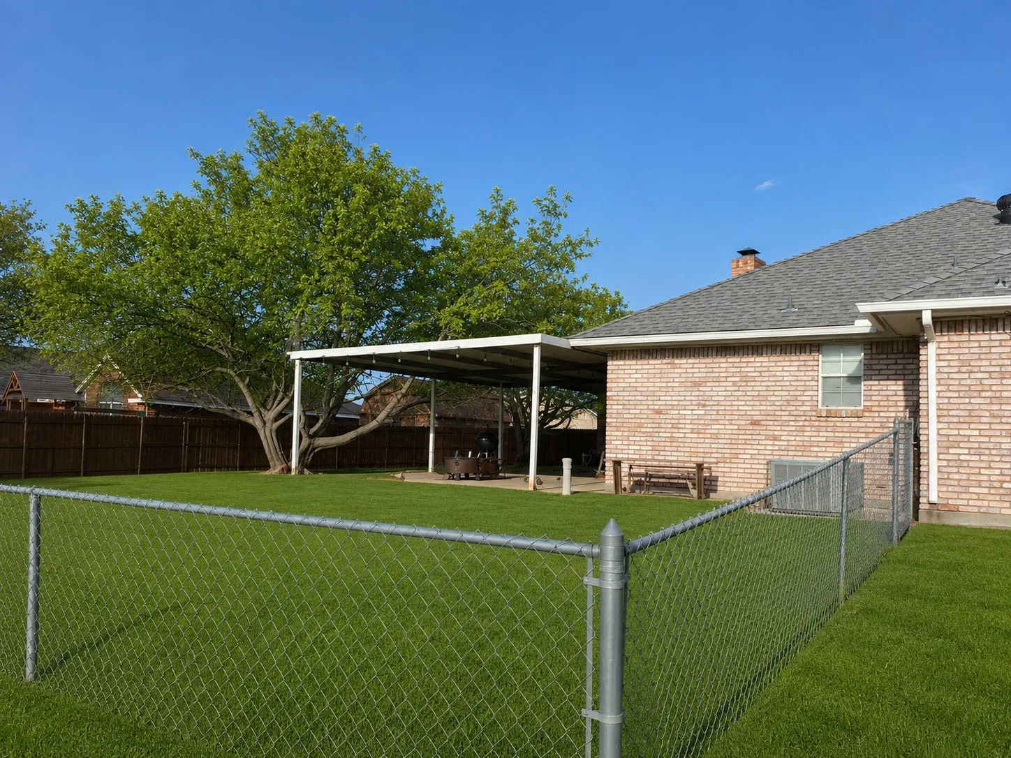 View of yard with fence