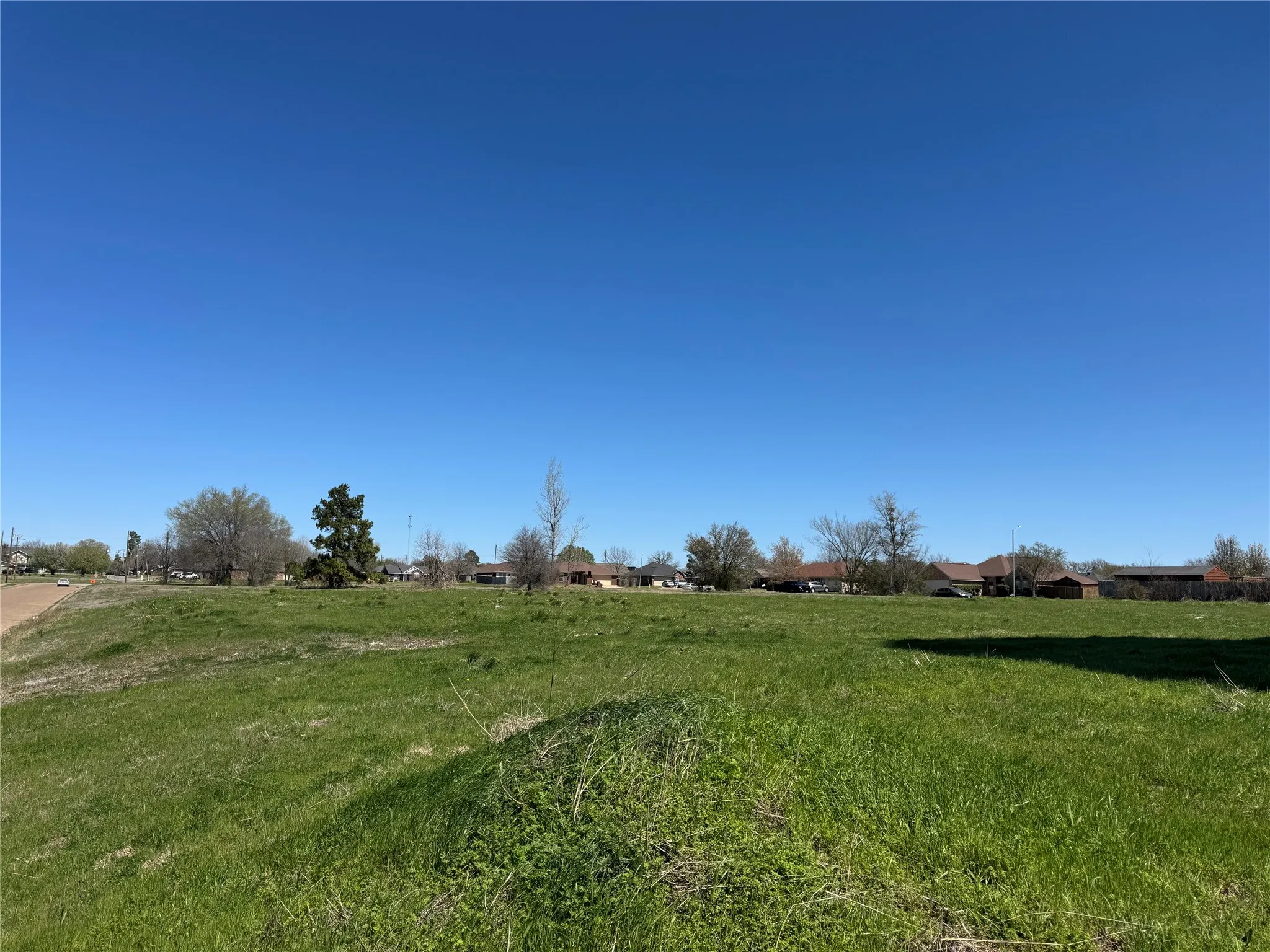 View of yard with a rural view