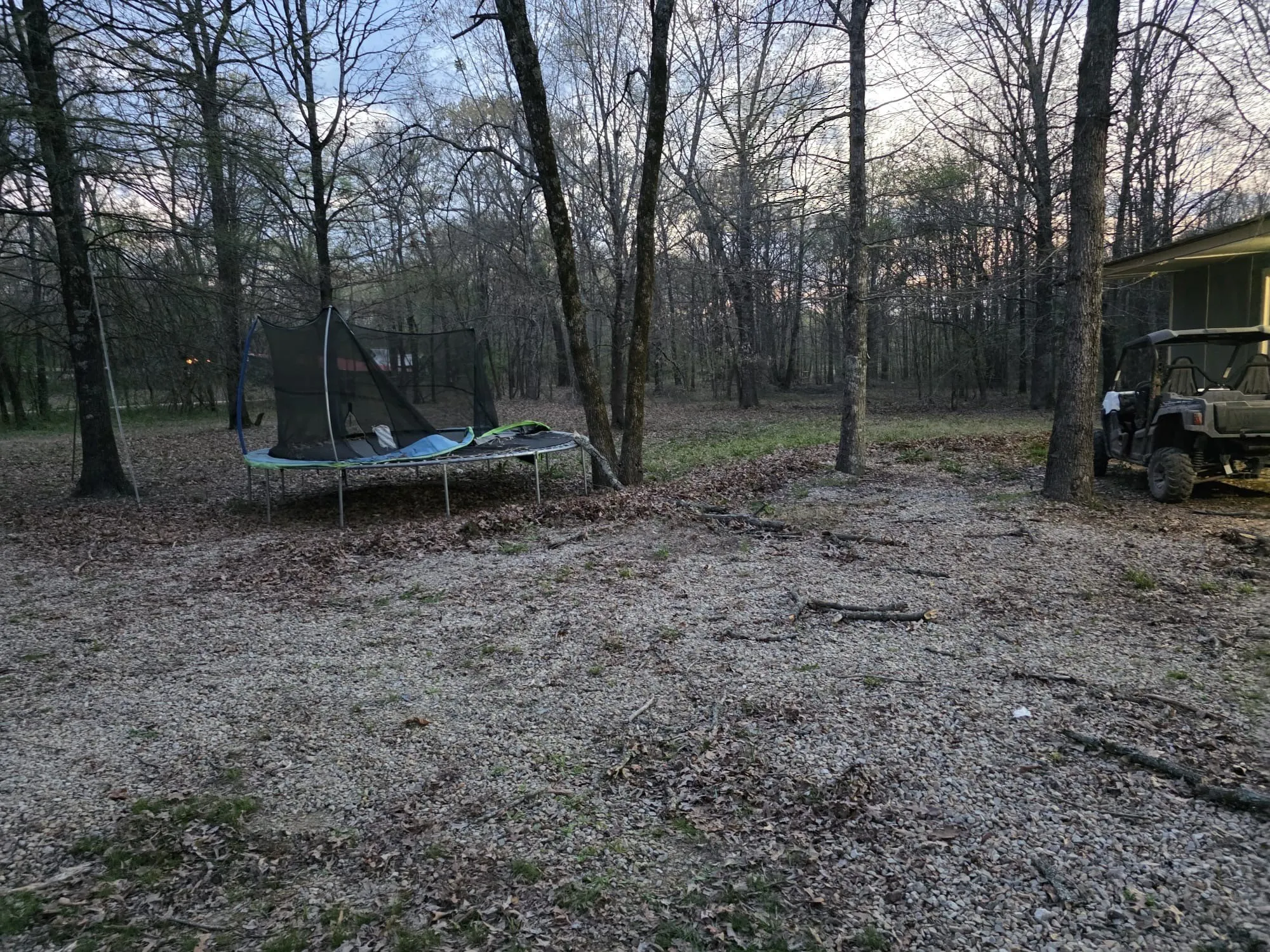 View of yard featuring a trampoline