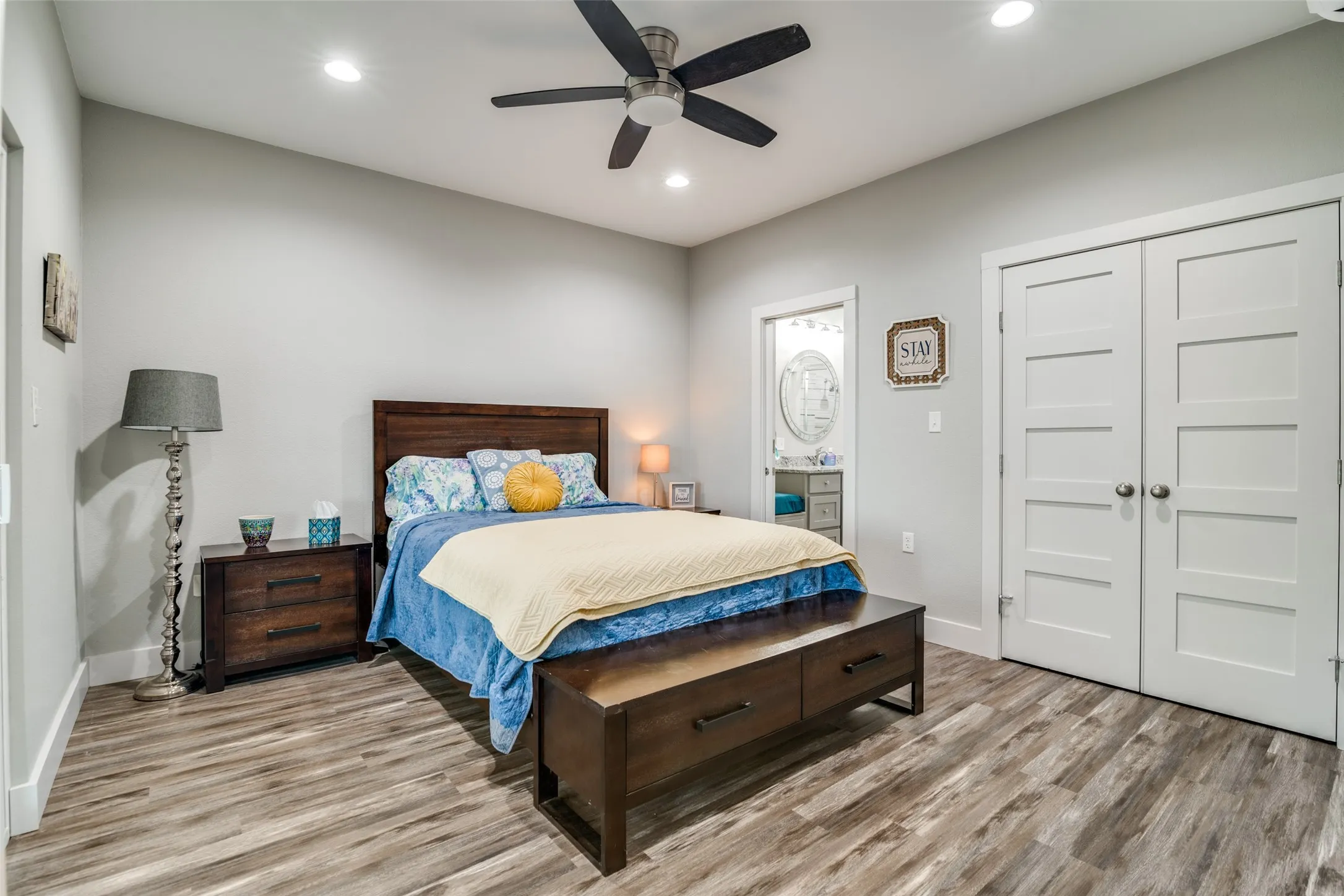 Bedroom with a closet, baseboards, ceiling fan, recessed lighting